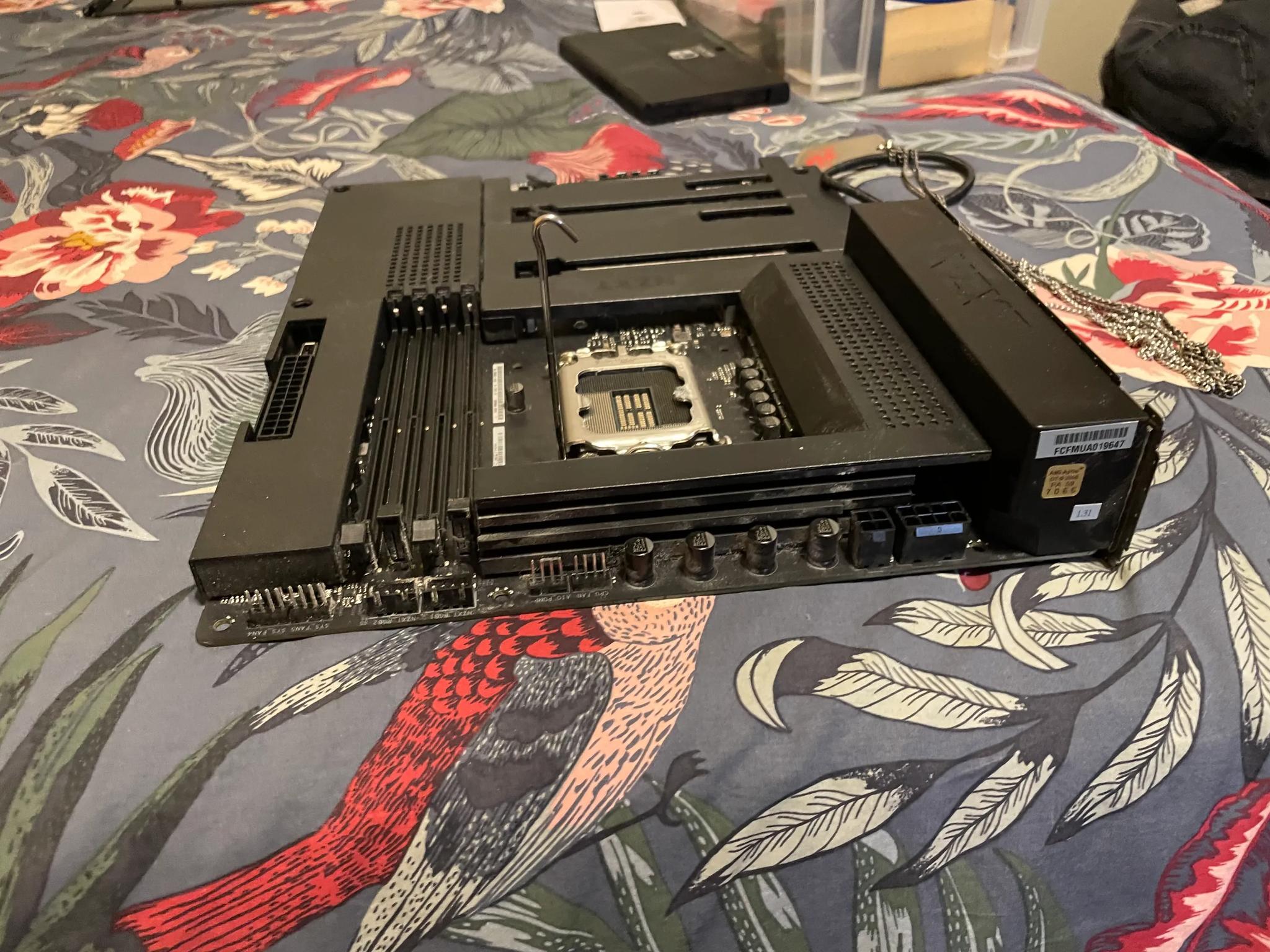 NZXT N7 Z790 Intel Motherboard Black (top PCLe tab is broken off)