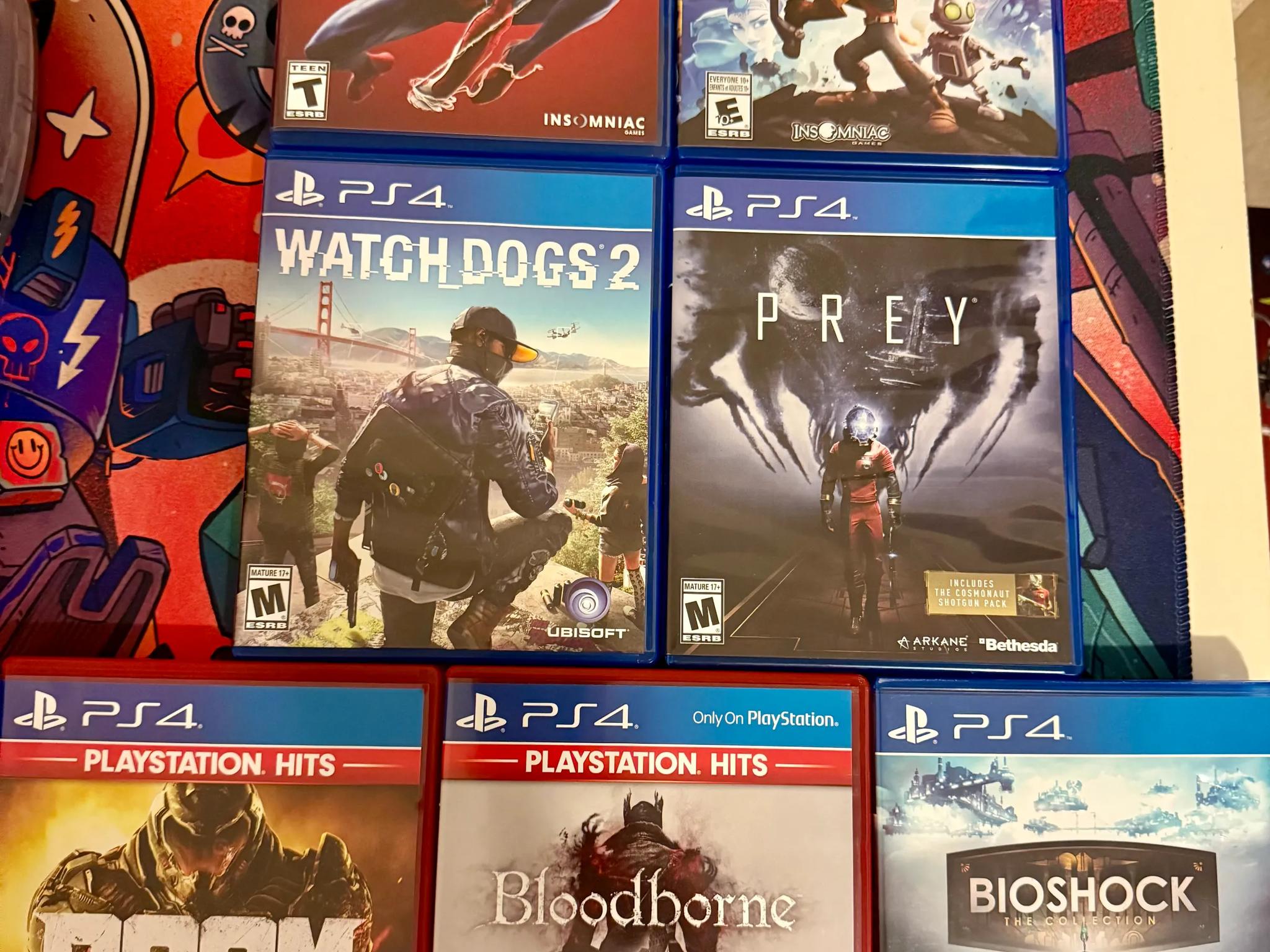 Sony PlayStation 4 Pro 1TB Console (Black) + 7 Games