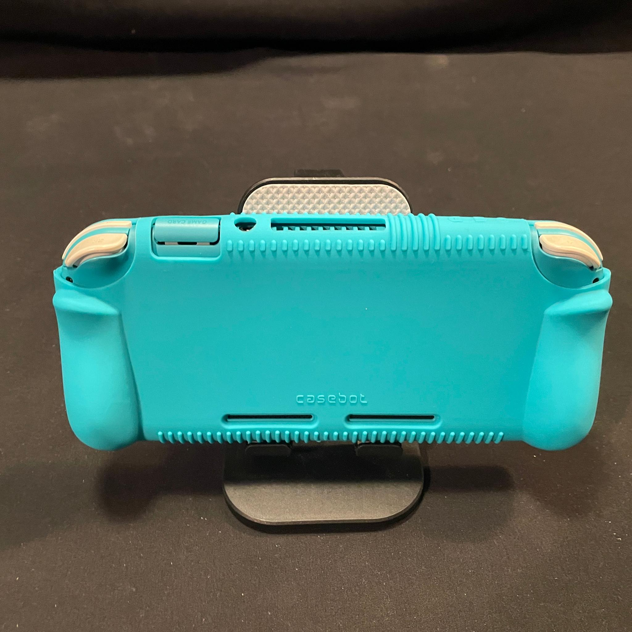 Nintendo Switch Lite Blue With Grip Case And Accessories
