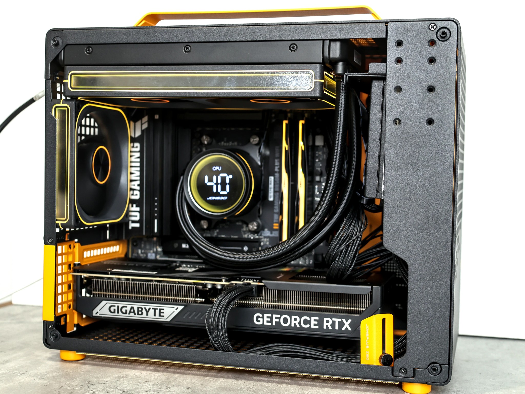 I Feel Orange - Compact 20L 9850X3D+ 5080 Build