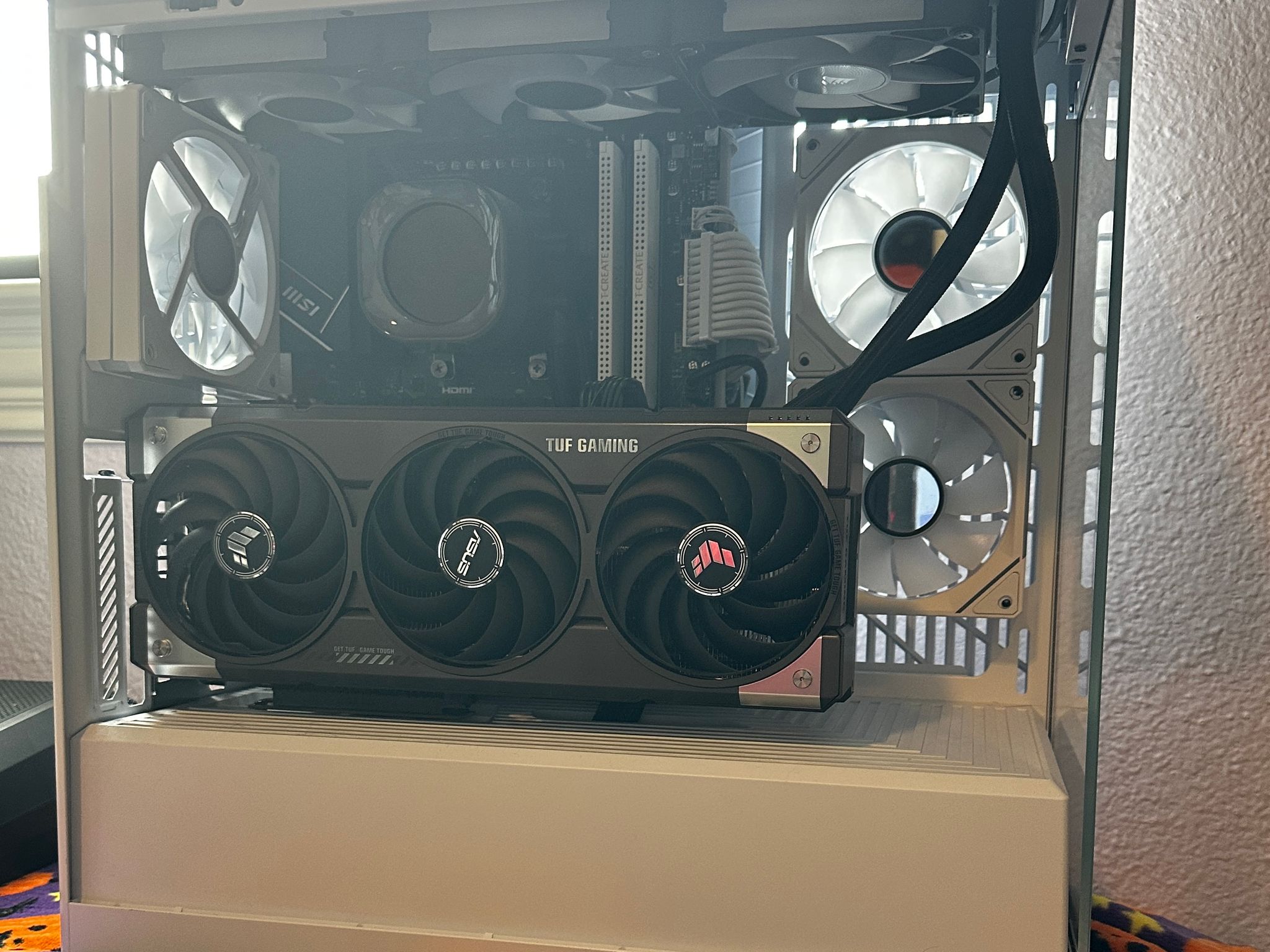 White & Black Hyte Y40, 7800x3d paired with an ASUS TUF 5070ti 16gb