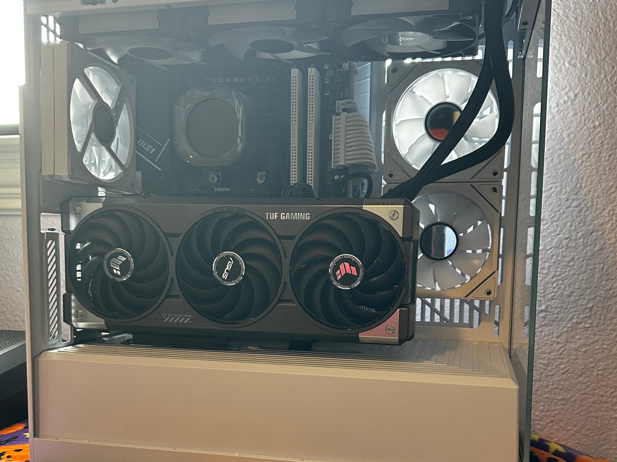 White & Black Hyte Y40, 7800x3d paired with an ASUS TUF 5070ti 16gb