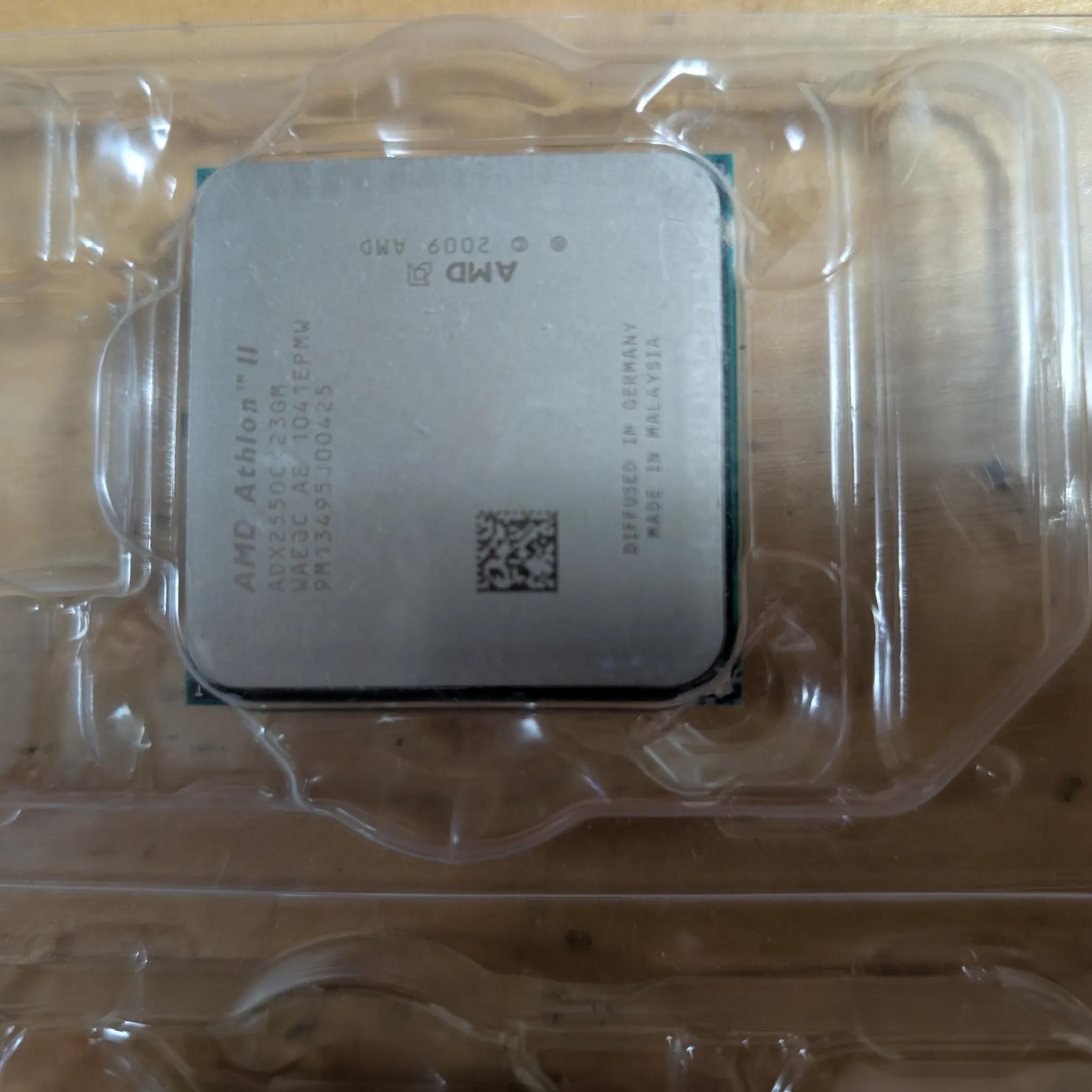 AMD Phenom X4 9600 BE + Athlon II X2 255