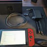Nintendo Switch 32GB - All Original Accessories + Mario Red Joy Con Pair