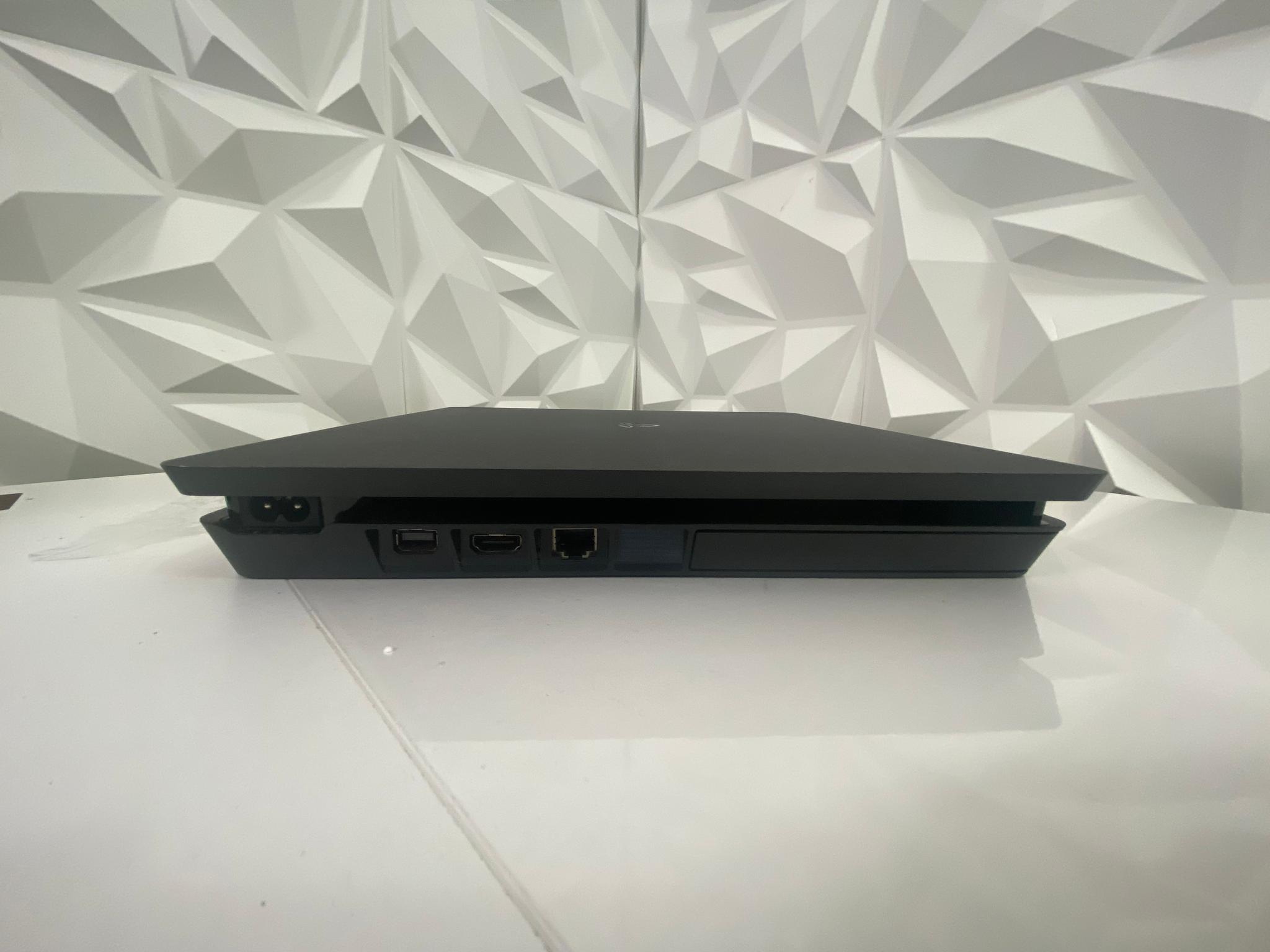 PS4 Slim 1TB with 2 Controllers and 2 Free Games ( Fifa 20 + The Crew 2 ) Good Condition