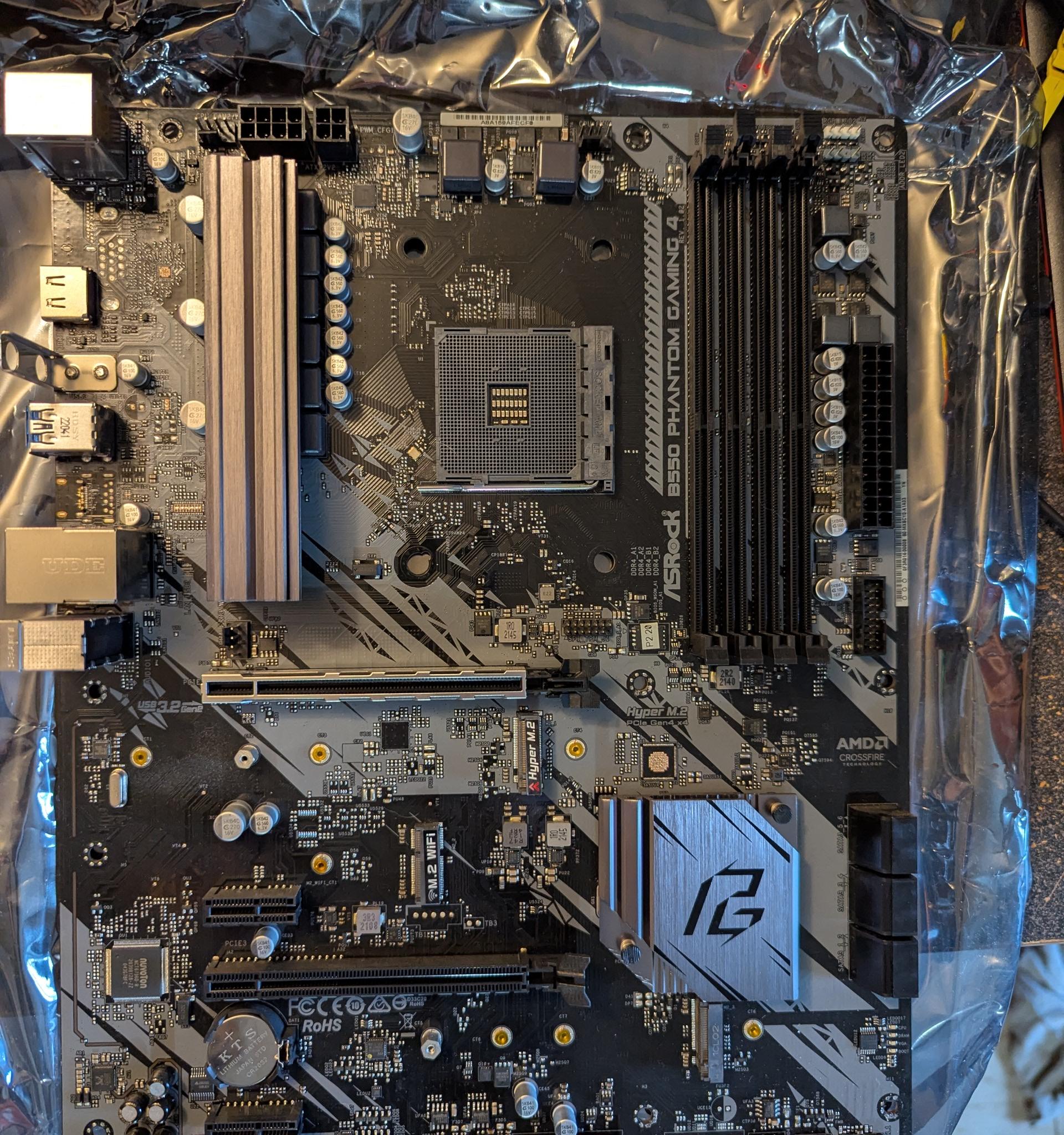 Asrock B550 Phantom Gaming 4 Lightly used. Slot for M.2 Wifi card.