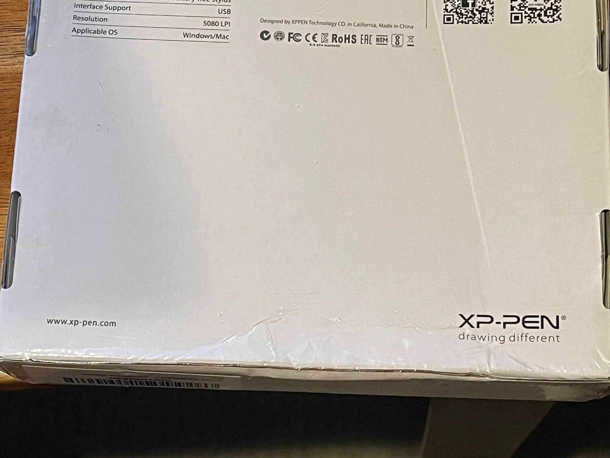 drawing pen/ tablet? Idk much about it, box has some dents but factory seal.