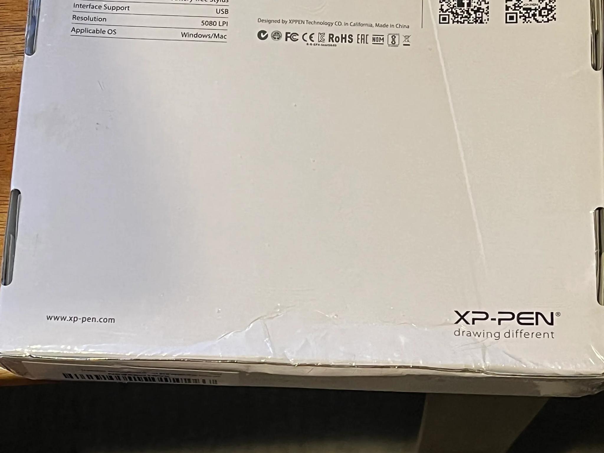 drawing pen/ tablet? Idk much about it, box has some dents but factory seal.
