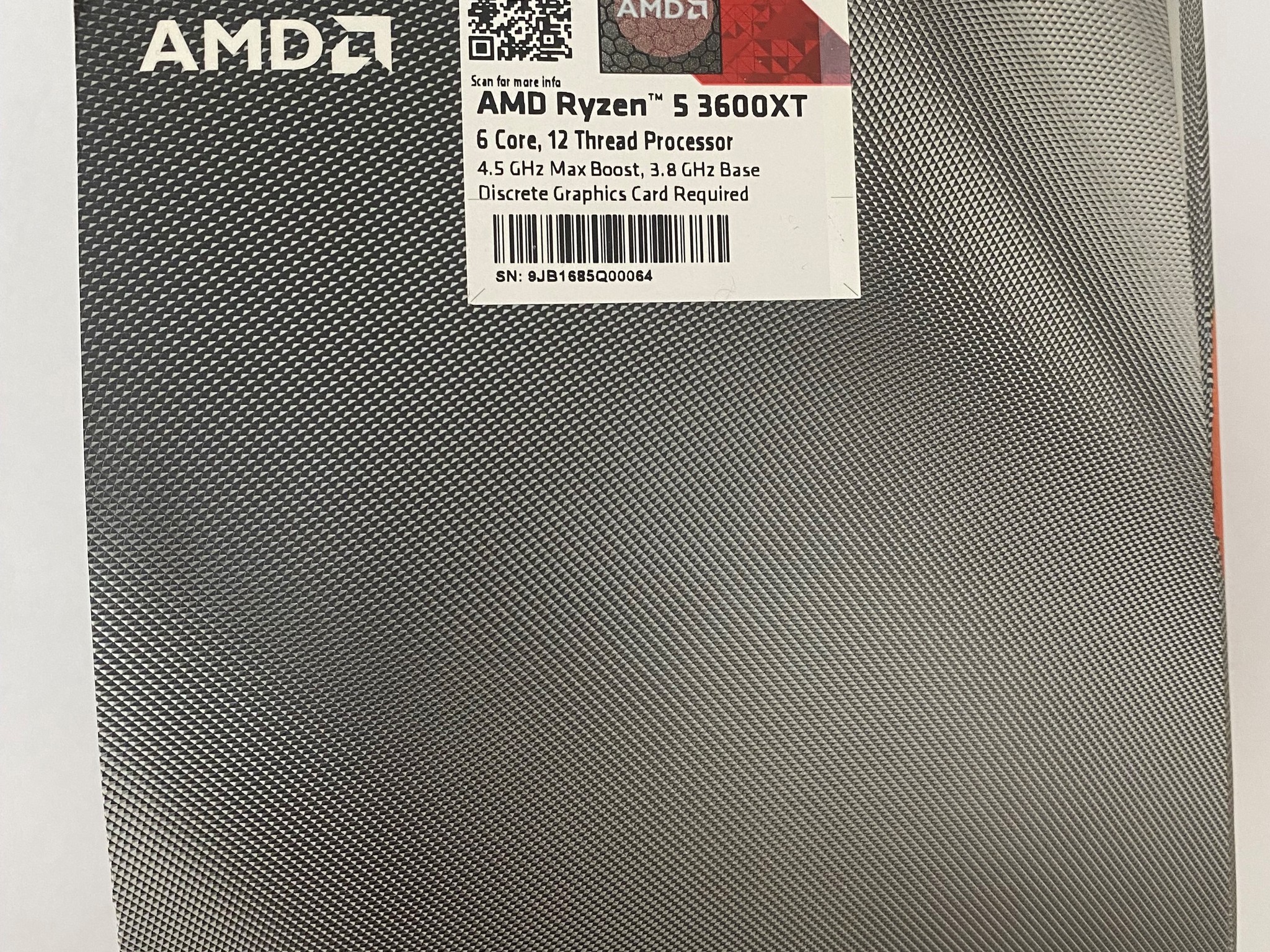 AMD Ryzen 5 3600XT 3.8 GHz 6-Core Processor and AMD Cooler in box.