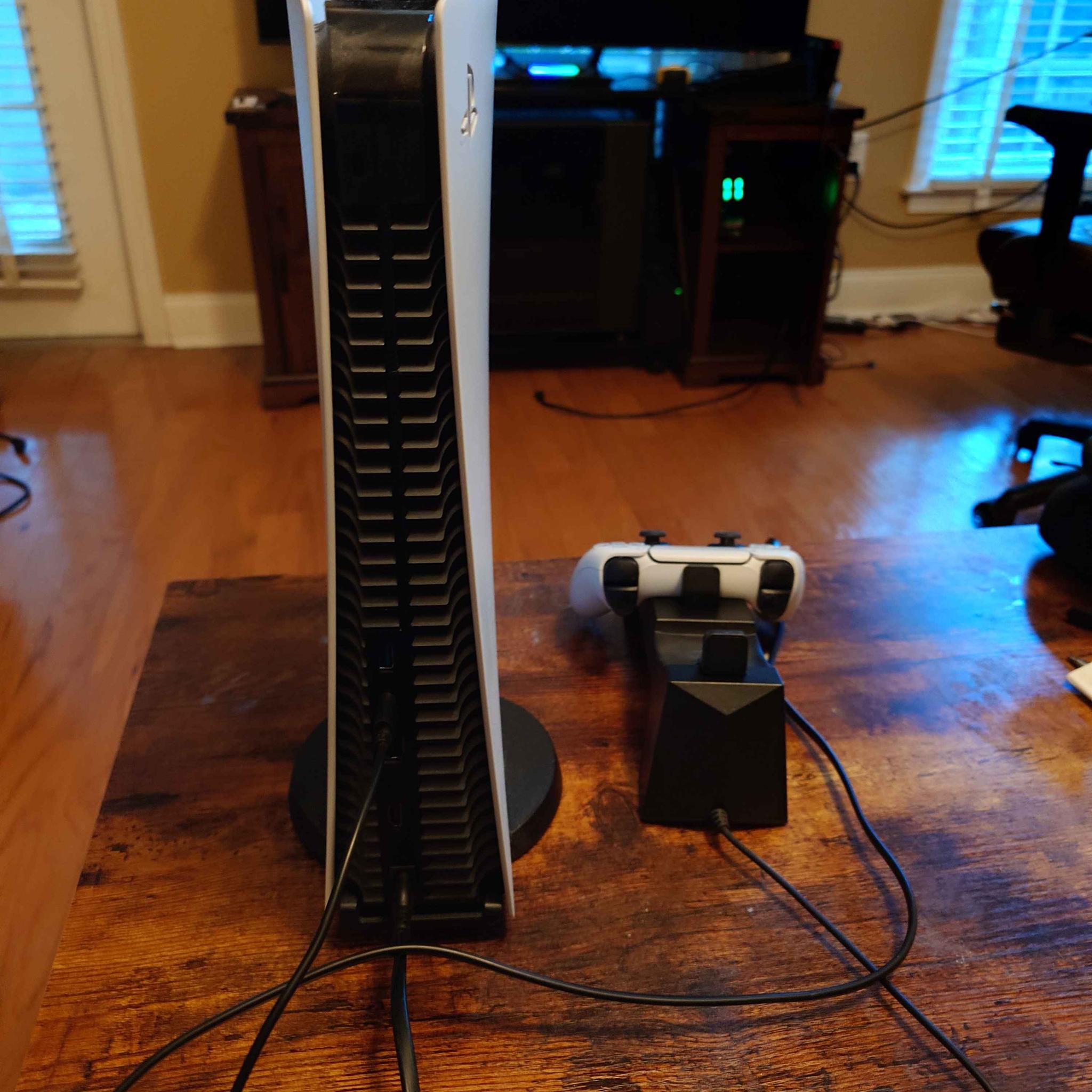 Playstation 5, with full cabling, controller, and controller charging dock