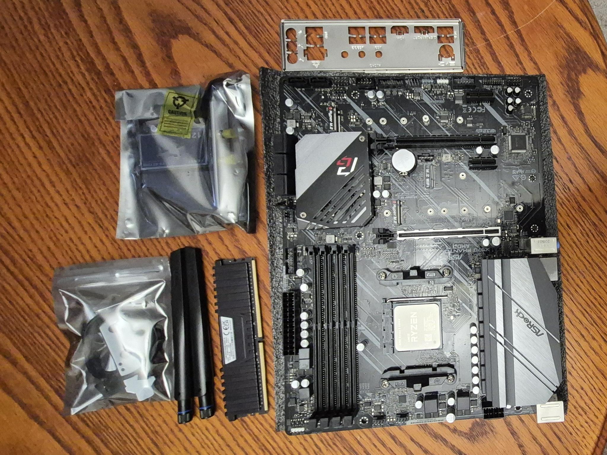 Combo ASRock X570 PHANTOM GAMING 4, AMD Ryzen 5 5600X AM4 CPU, 32GB RAM, AC1200 PCI-E WiFi Card