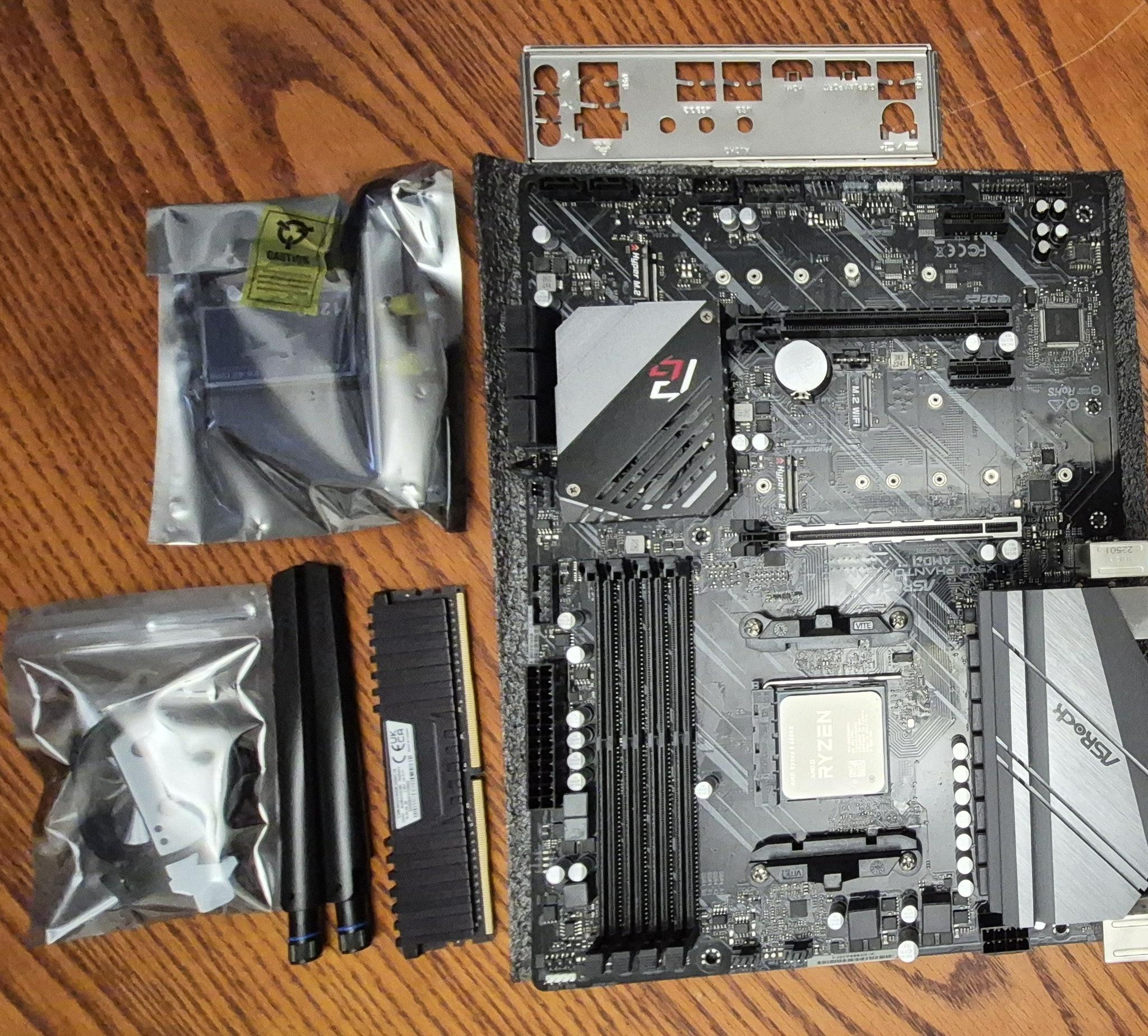 Combo ASRock X570 PHANTOM GAMING 4, AMD Ryzen 5 5600X AM4 CPU, 32GB RAM, AC1200 PCI-E WiFi Card