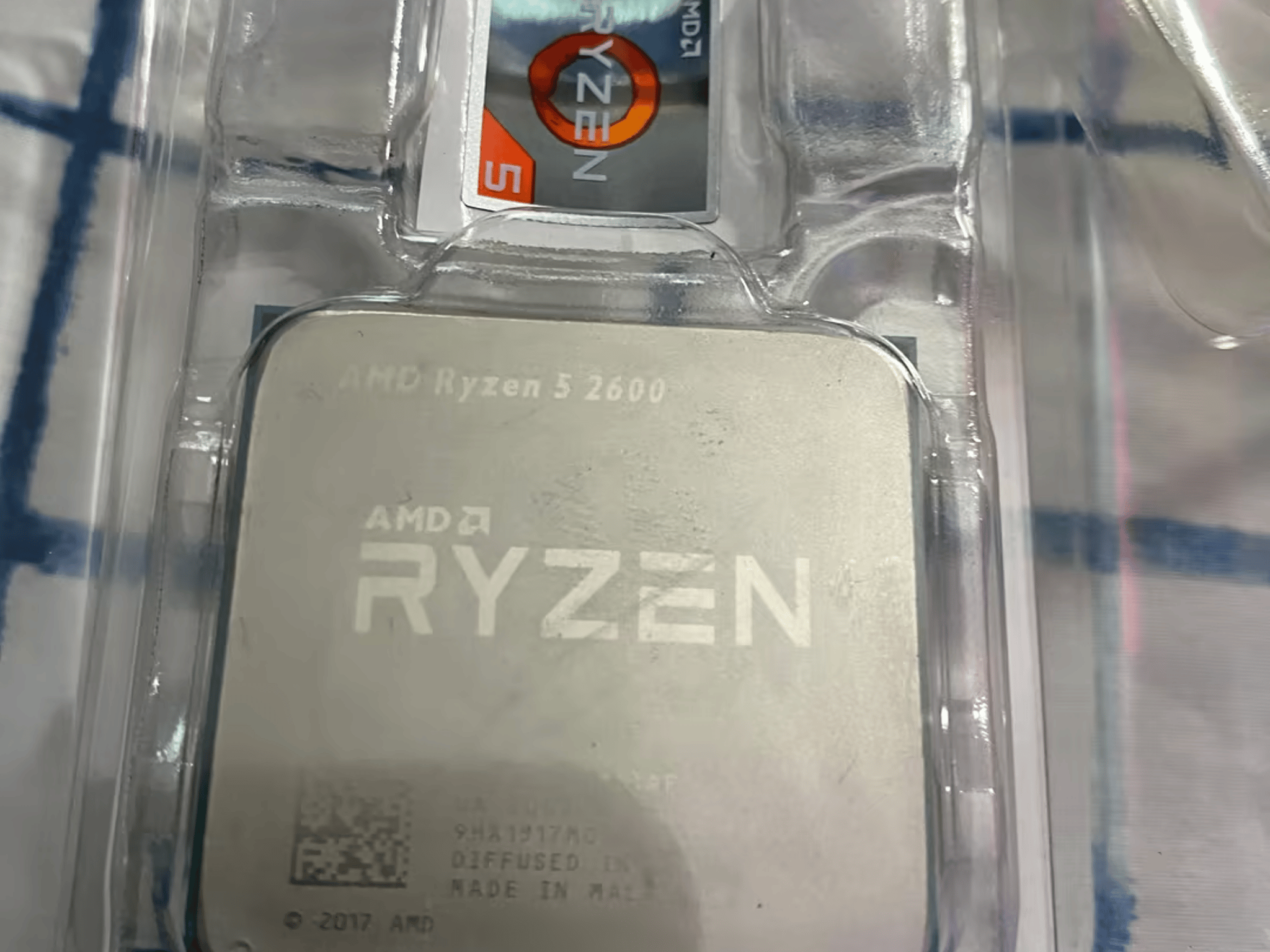 Ryzen 5 2600 (comes with box + cooler) 