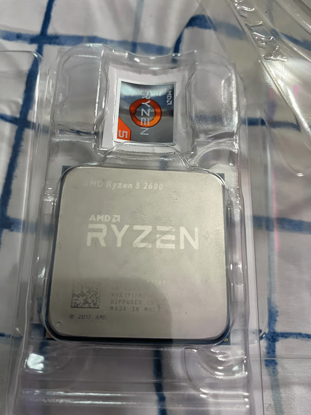 Ryzen 5 2600 (comes with box + cooler) 