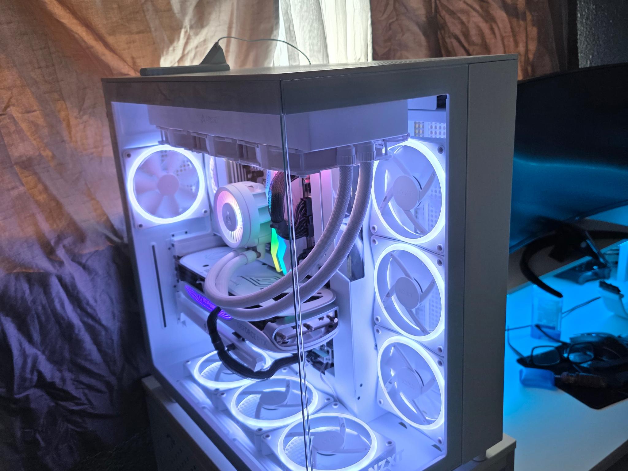 Nzxt white h9 flow/elite mesh and glass top panel included . Ryzen 7 9800xd, 4080 super, aorus x870e