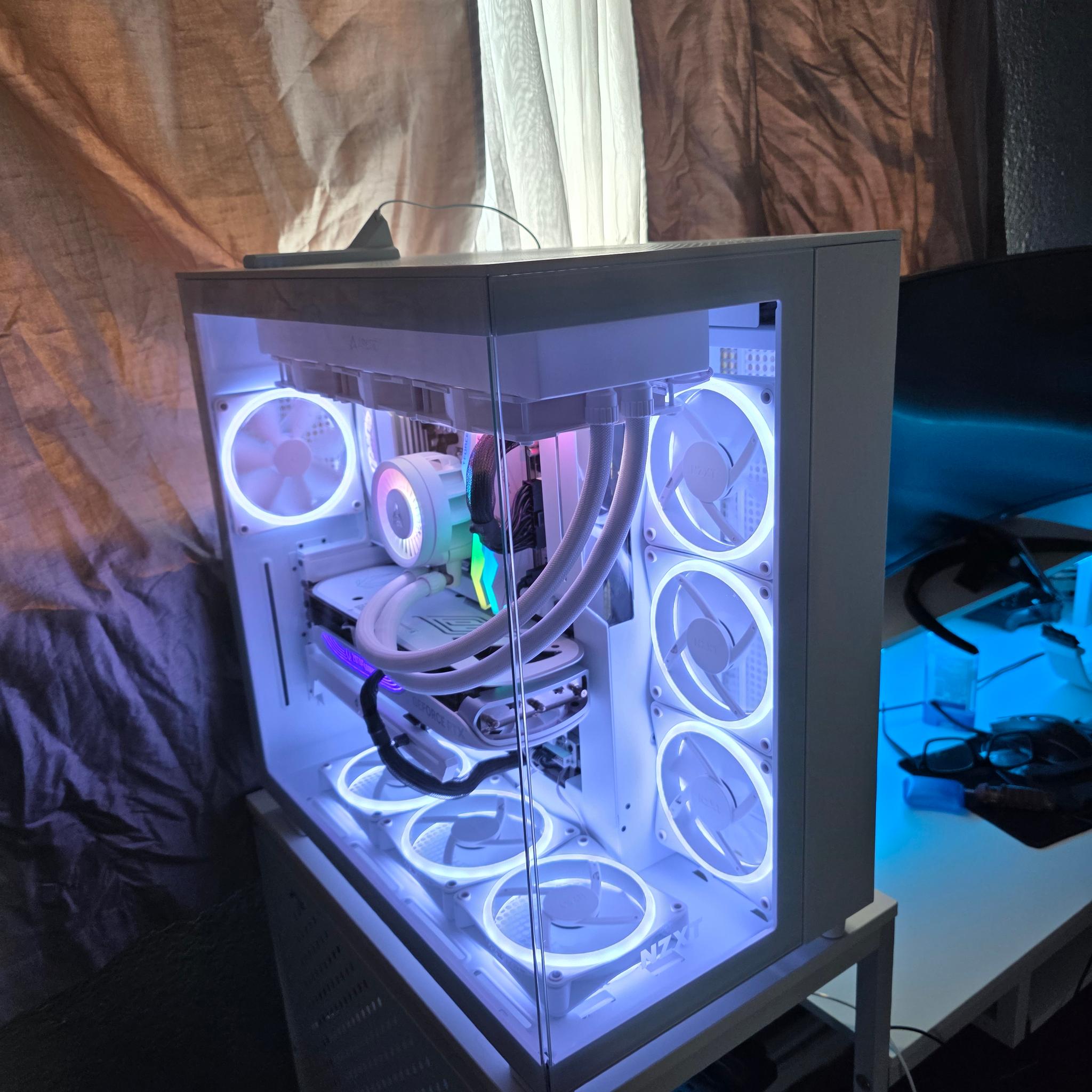 Nzxt white h9 flow/elite mesh and glass top panel included . Ryzen 7 9800xd, 4080 super, aorus x870e