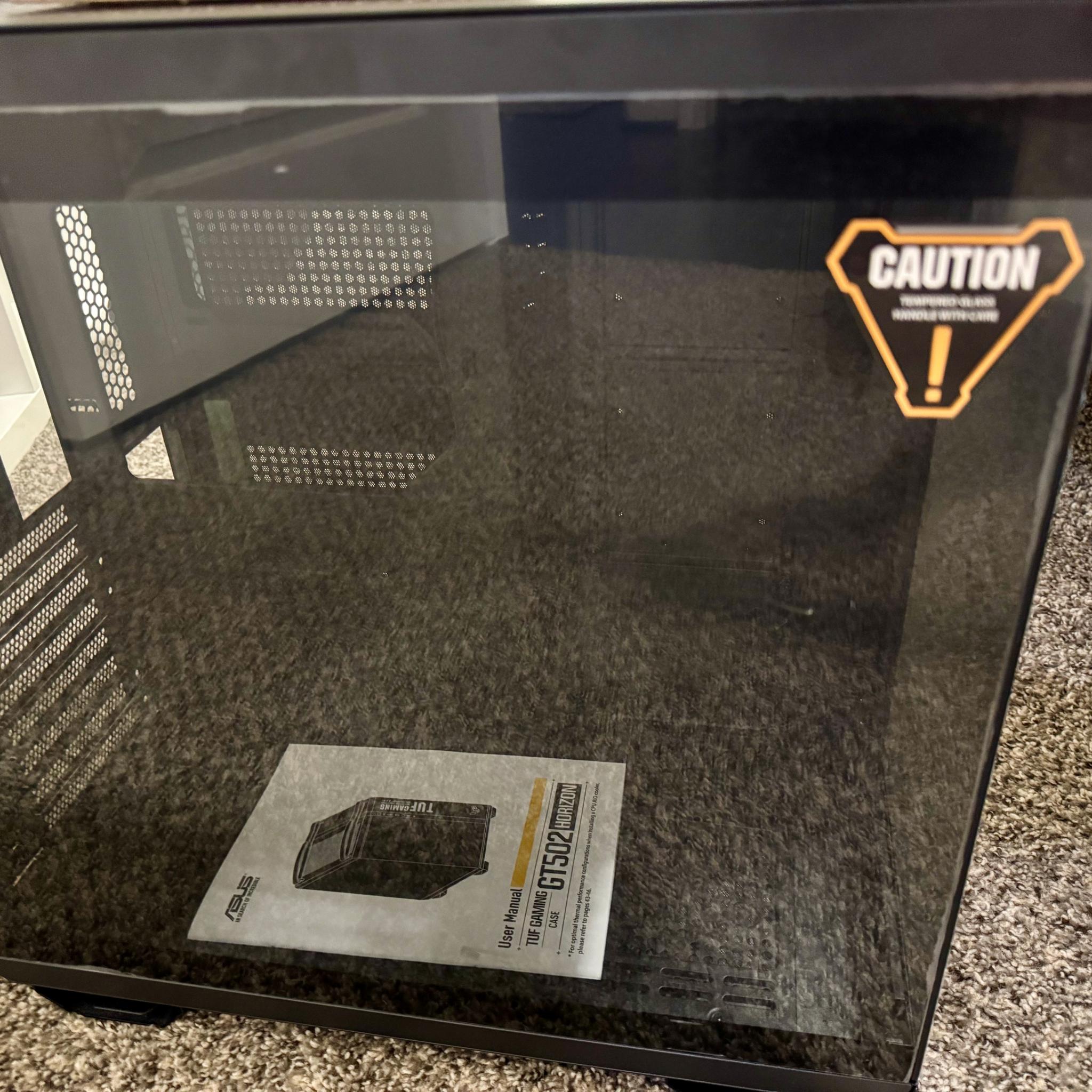 Black - Asus TUF Gaming GT502 in retail packaging.