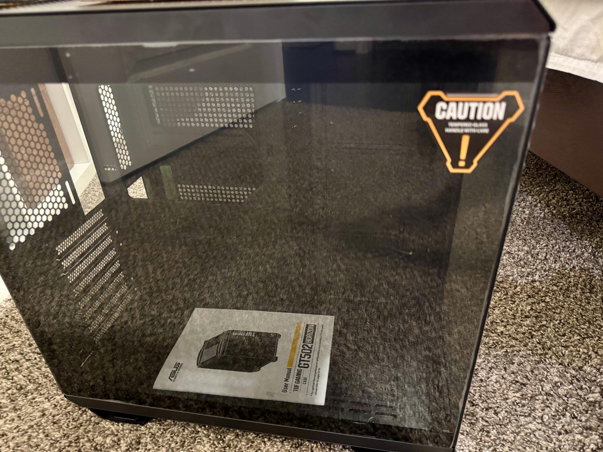 Black - Asus TUF Gaming GT502 in retail packaging.