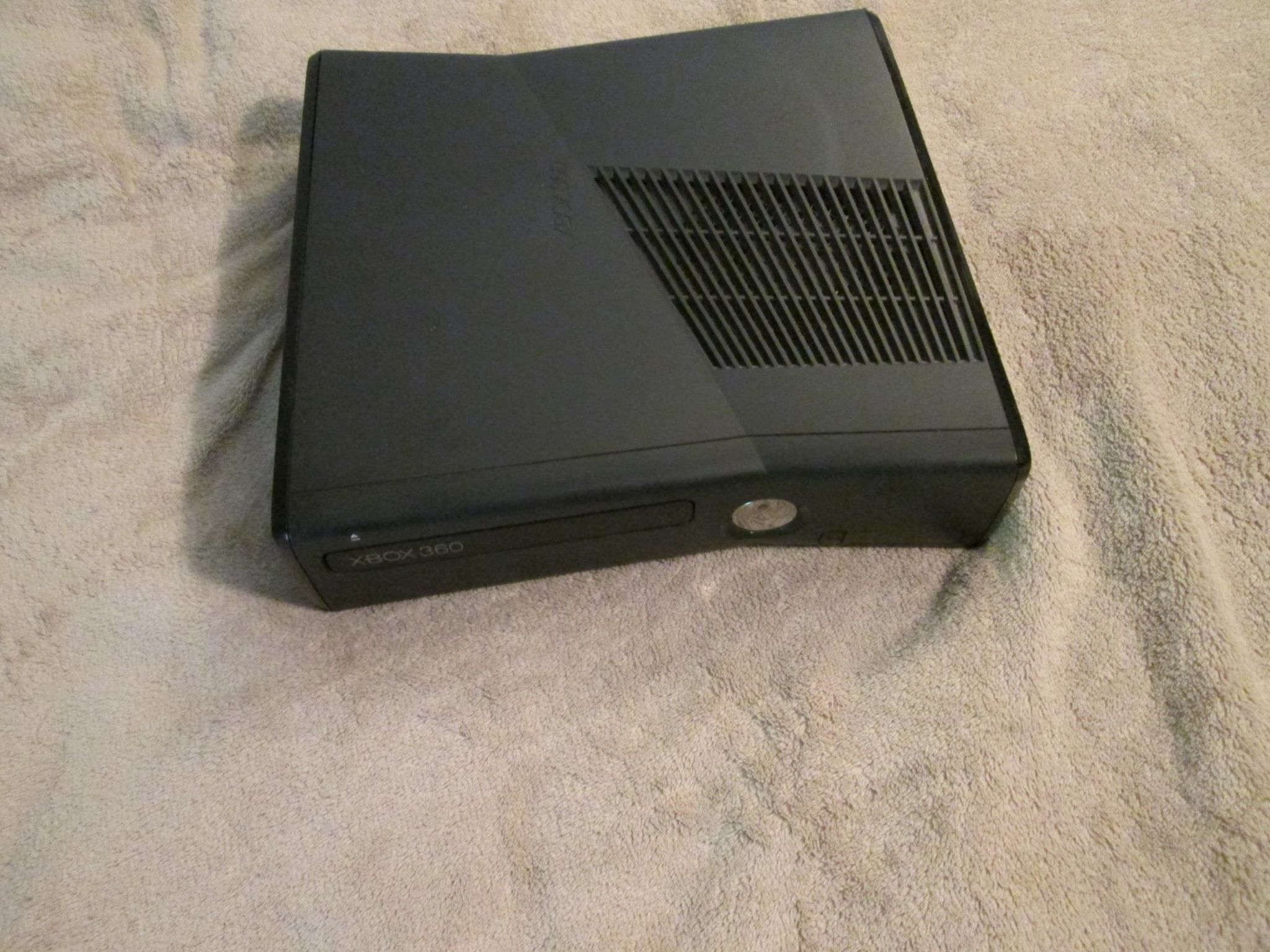 Xbox 360 Slim With White Controller, 4gb Internal Storage And 120gb Hard Drive