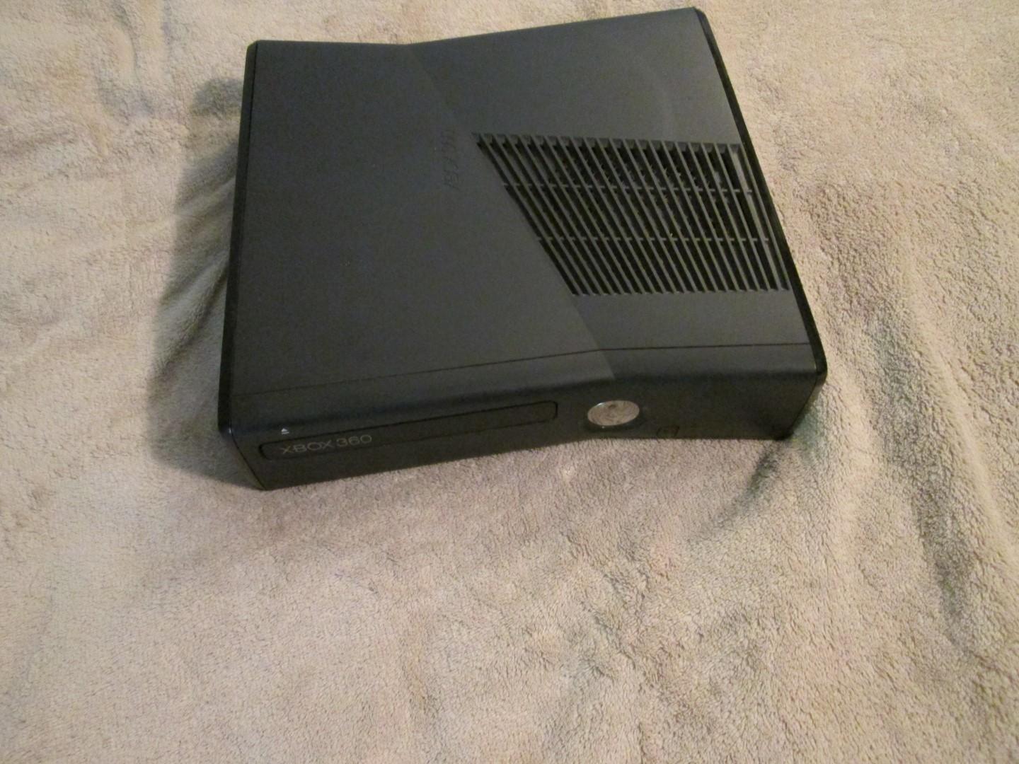 Xbox 360 Slim With White Controller, 4gb Internal Storage And 120gb Hard Drive