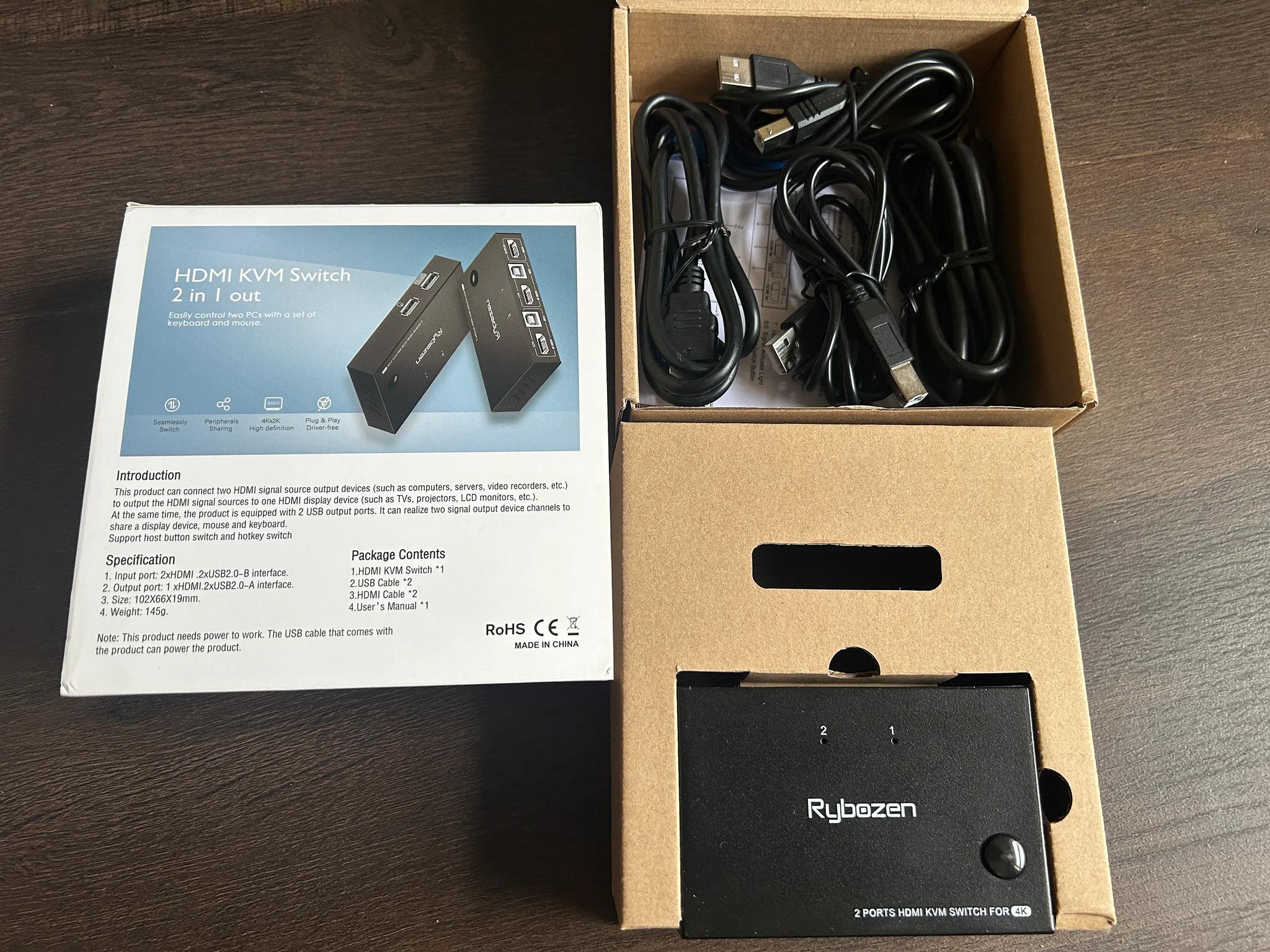 KVM Switch it connects 1 Keyboard, 1 Mouse  and 1 HDMI to 2 computers