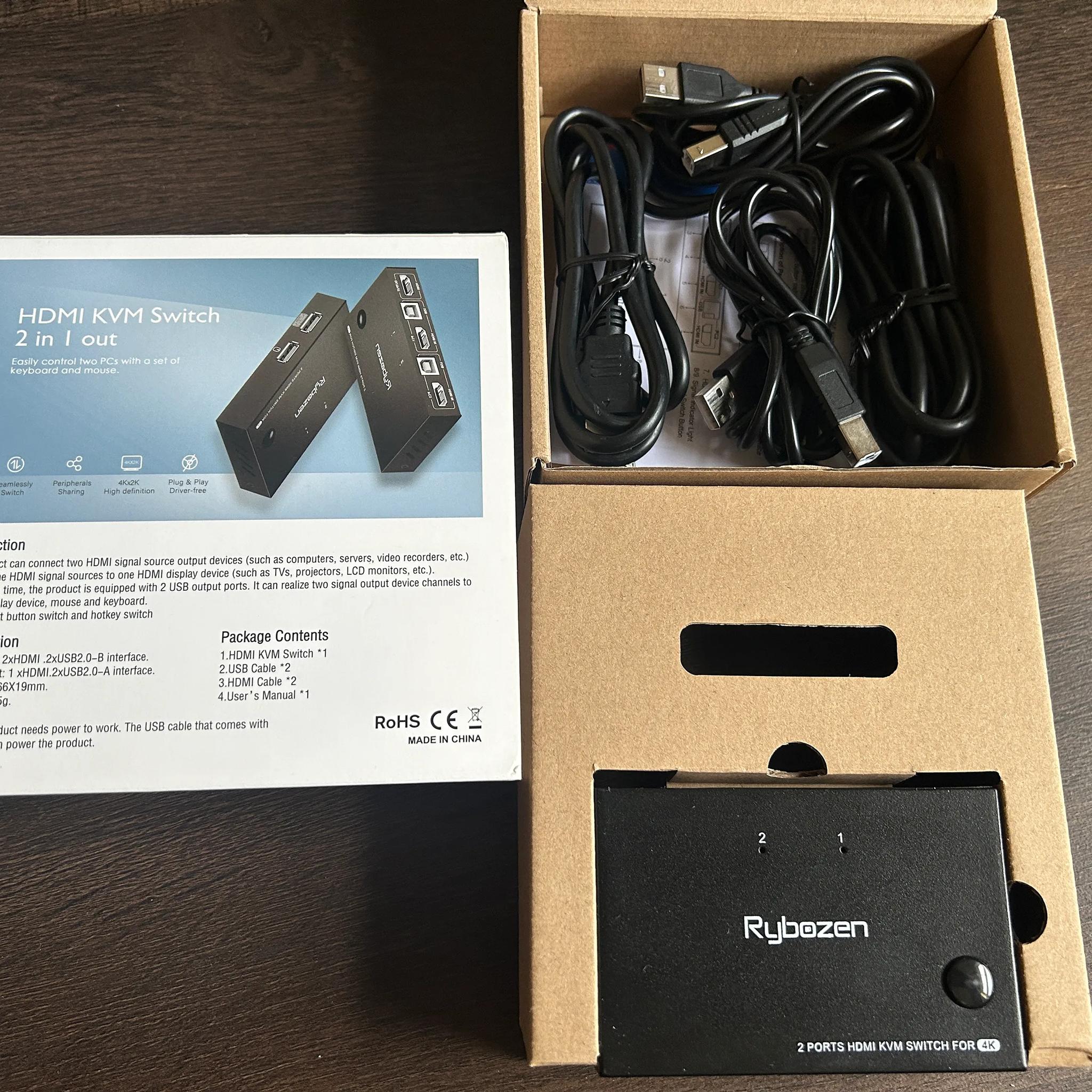 KVM Switch it connects 1 Keyboard, 1 Mouse  and 1 HDMI to 2 computers