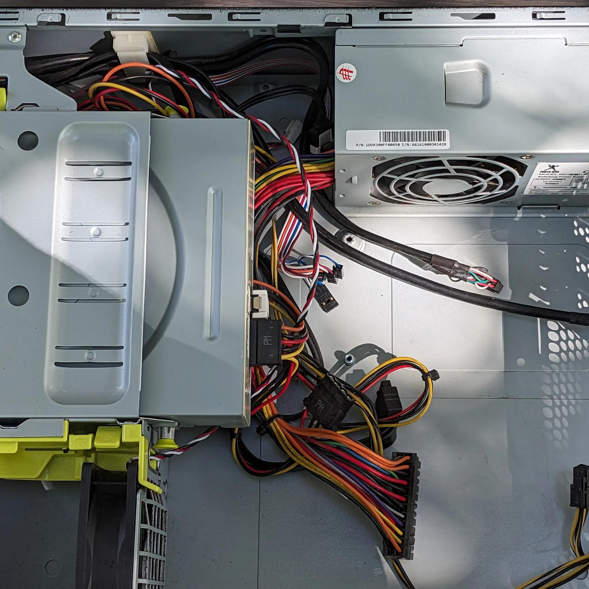 Two Slim PC cases! Both w/ 300W PSU and case fan! And, there is more: One optical drive!