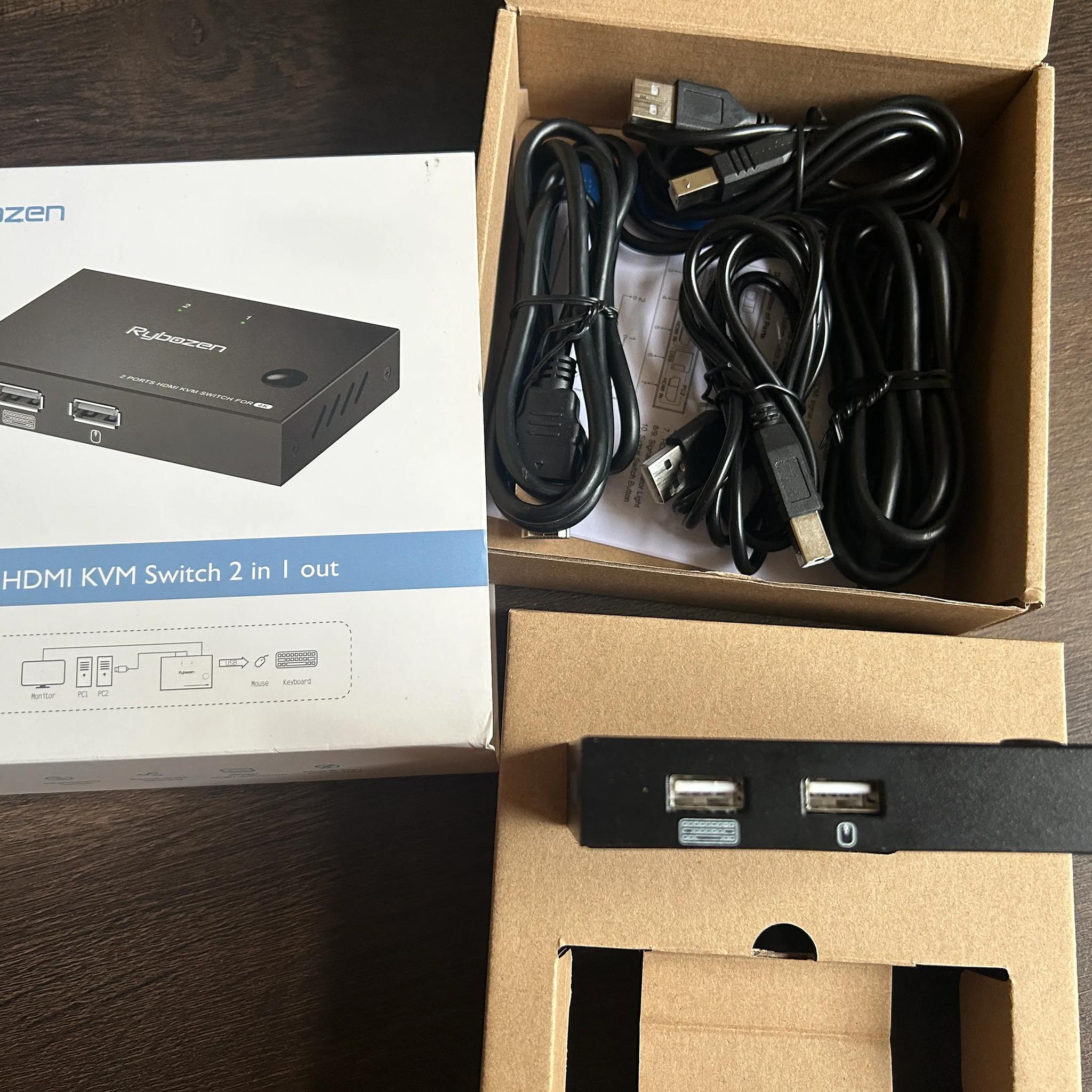 KVM Switch it connects 1 Keyboard, 1 Mouse  and 1 HDMI to 2 computers