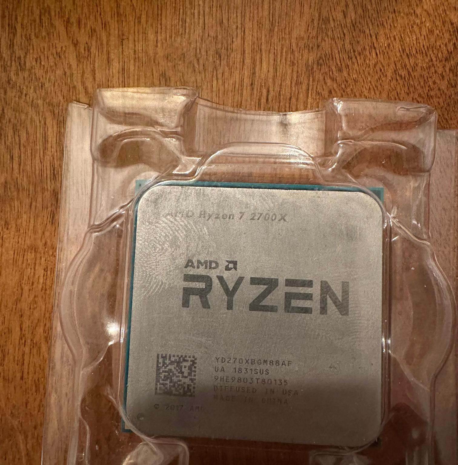 Ryzen 7 2700x w/ Wraith Stealth Cooler.