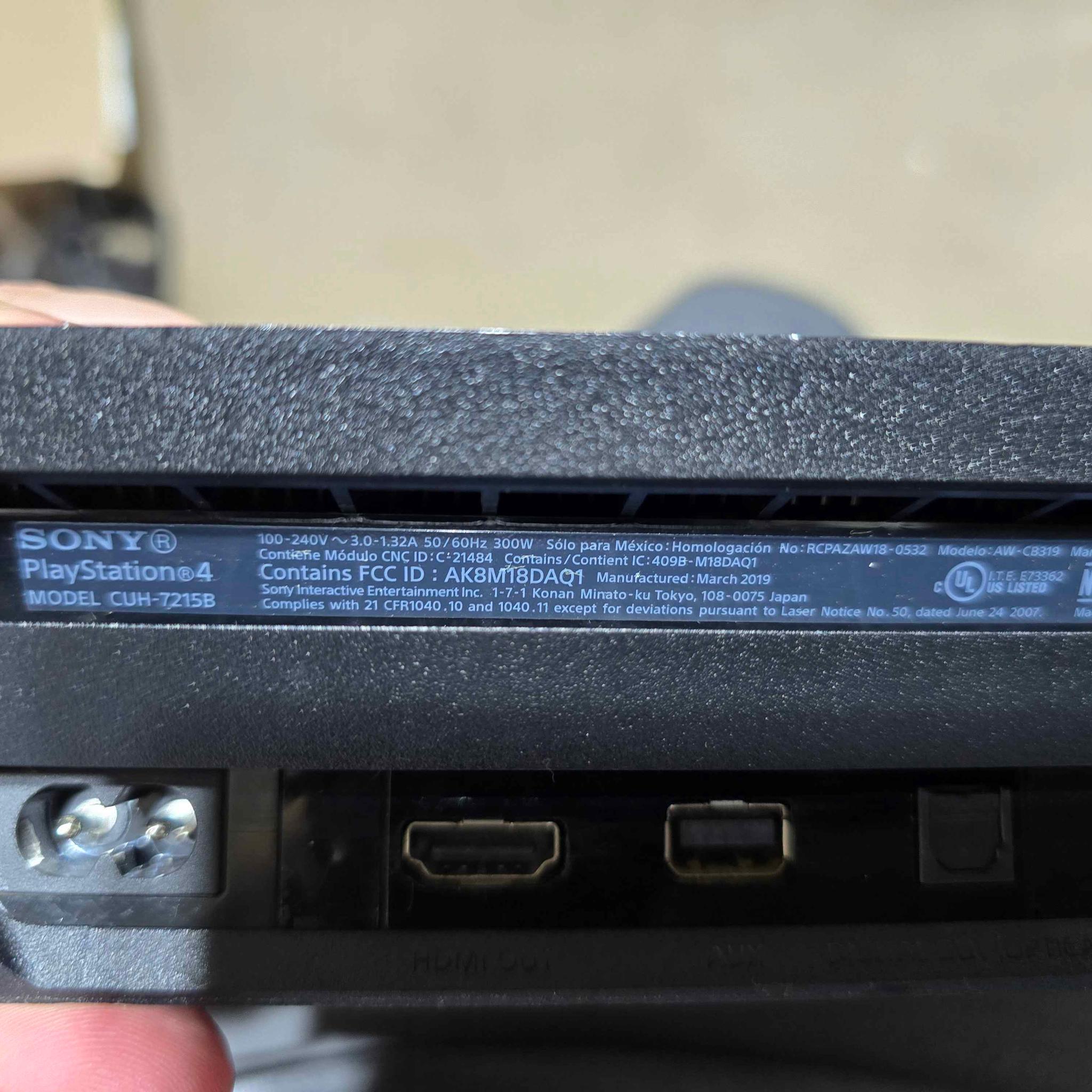 Sony PlayStation 4 Pro 1TB Console Black (incl. AC Adapter + Controller w/ Charger)