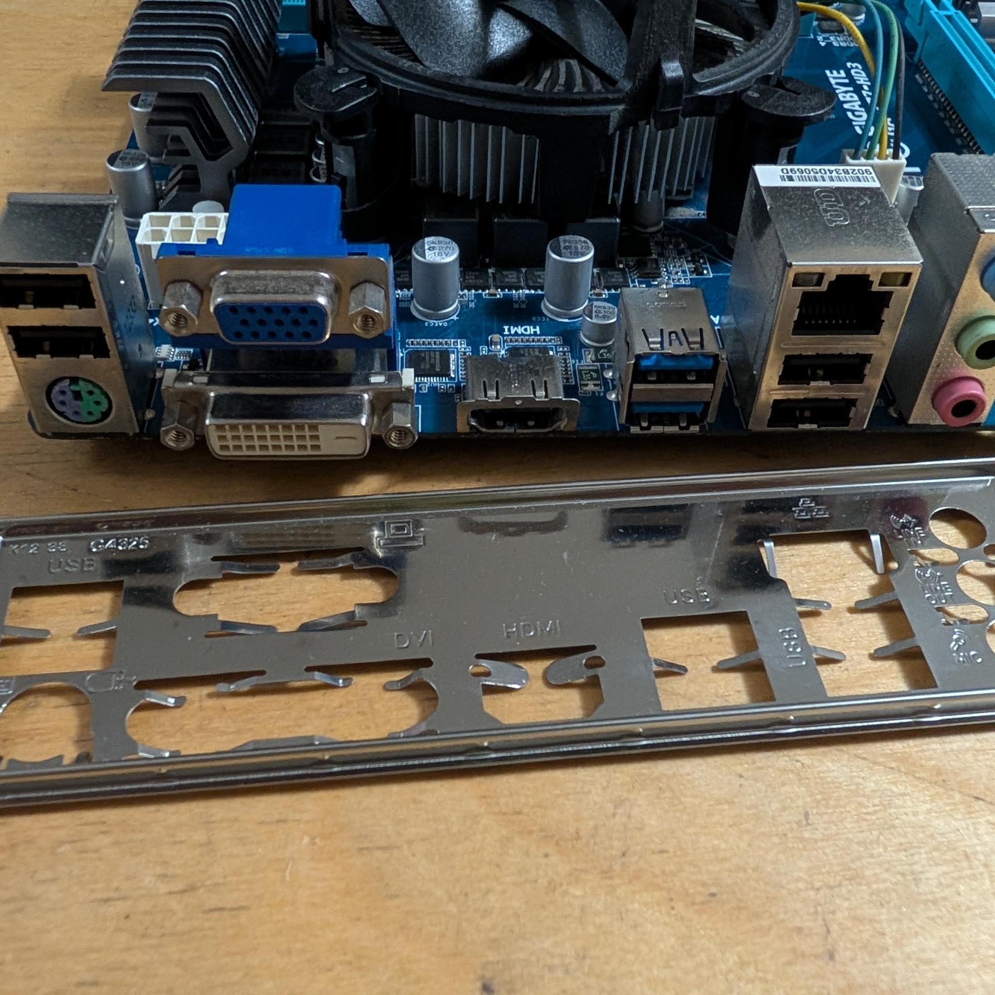 Core i7 3770 + Z77 motherboard + 16GB DDR3 + Nvidia GT210 1GB