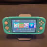 Nintendo Switch Lite Blue With Grip Case And Accessories