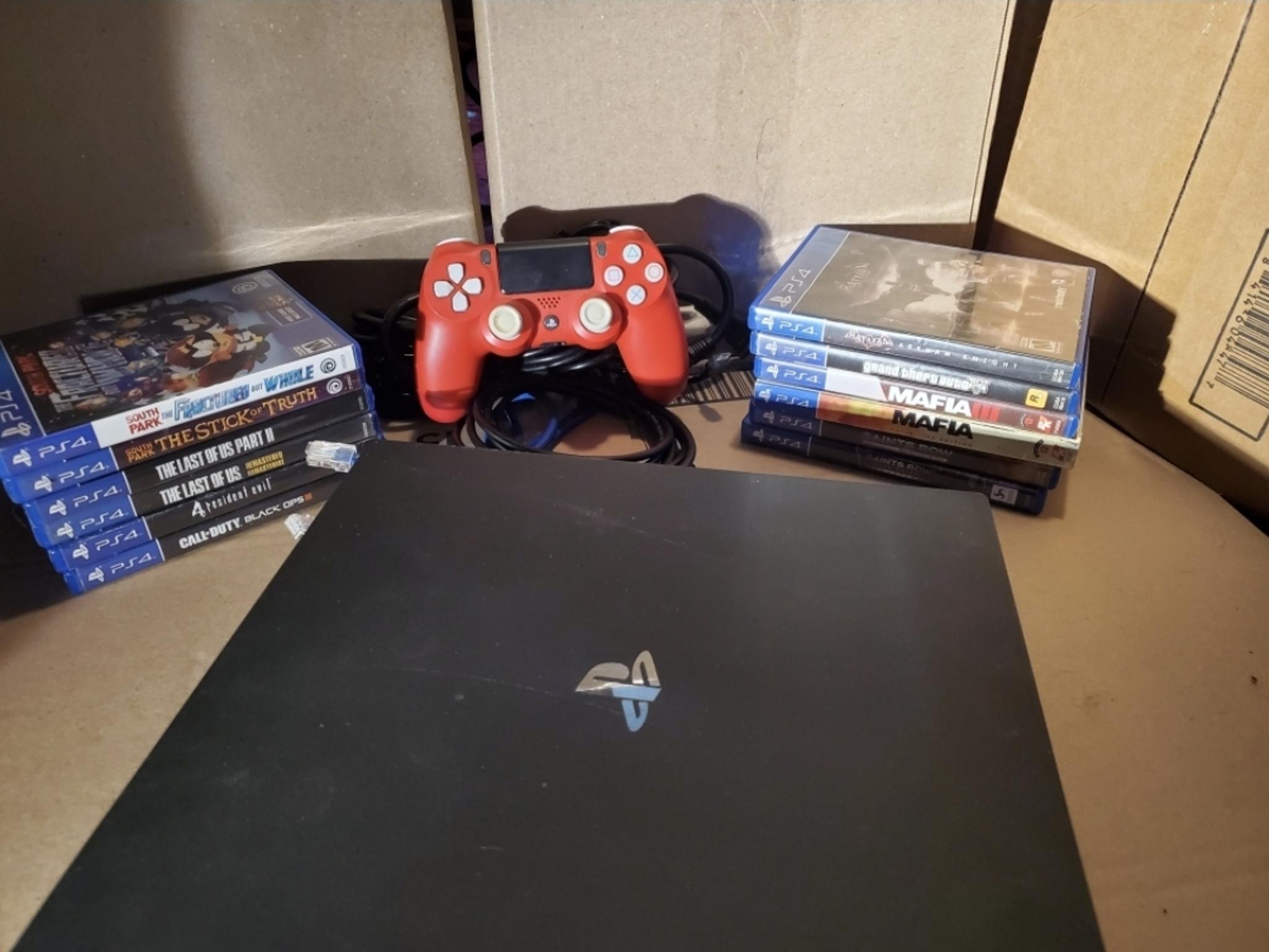PS4 pro 1TB, w/12 games, OEM controller Bundle