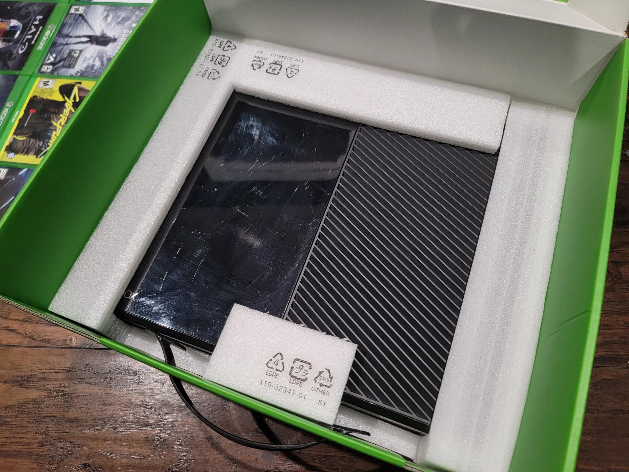 Xbox one with elite series 1 controller and 8 games