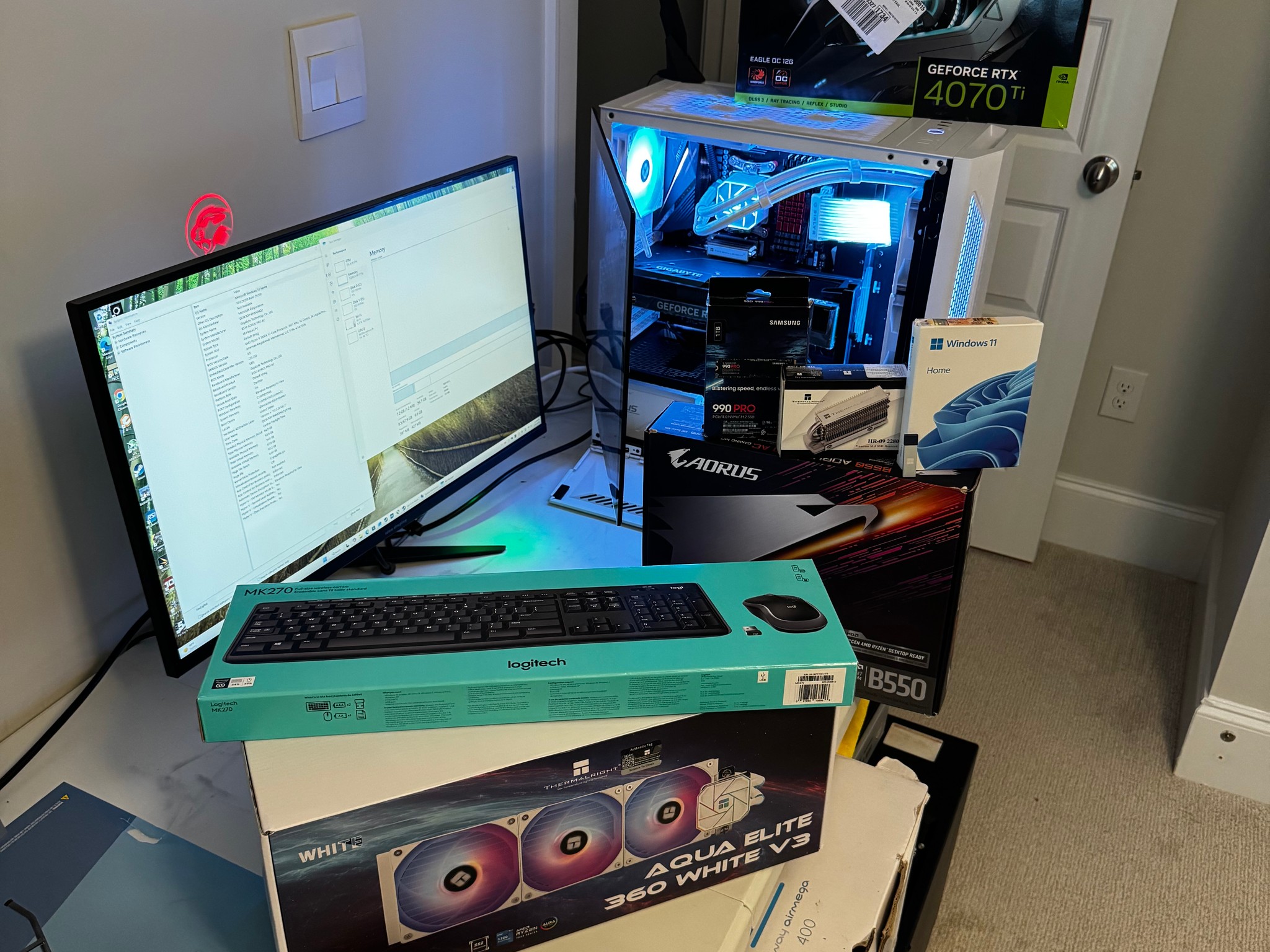 AMD AM4 new build Whiteout RTX 4070 Ti Gaming PC Build (12-Core Ryzen) + 2K and 1080p Monitors