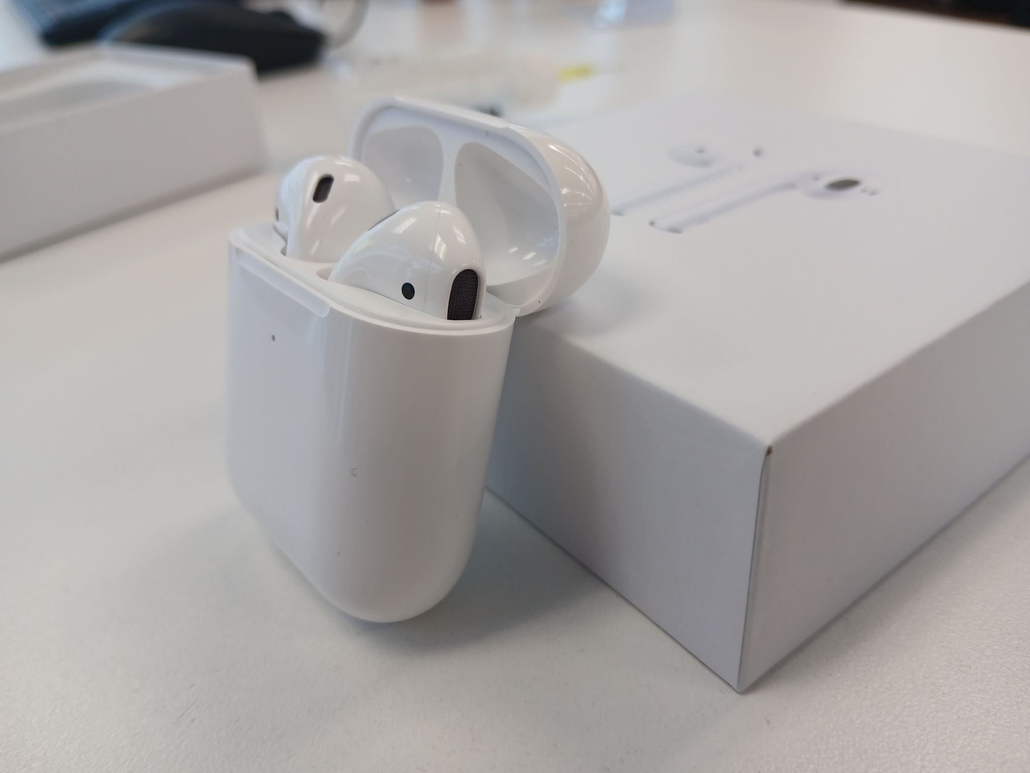 Airpods original packaging, charger and manual