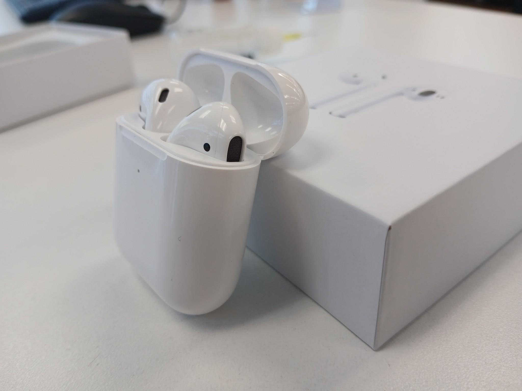 Airpods original packaging, charger and manual