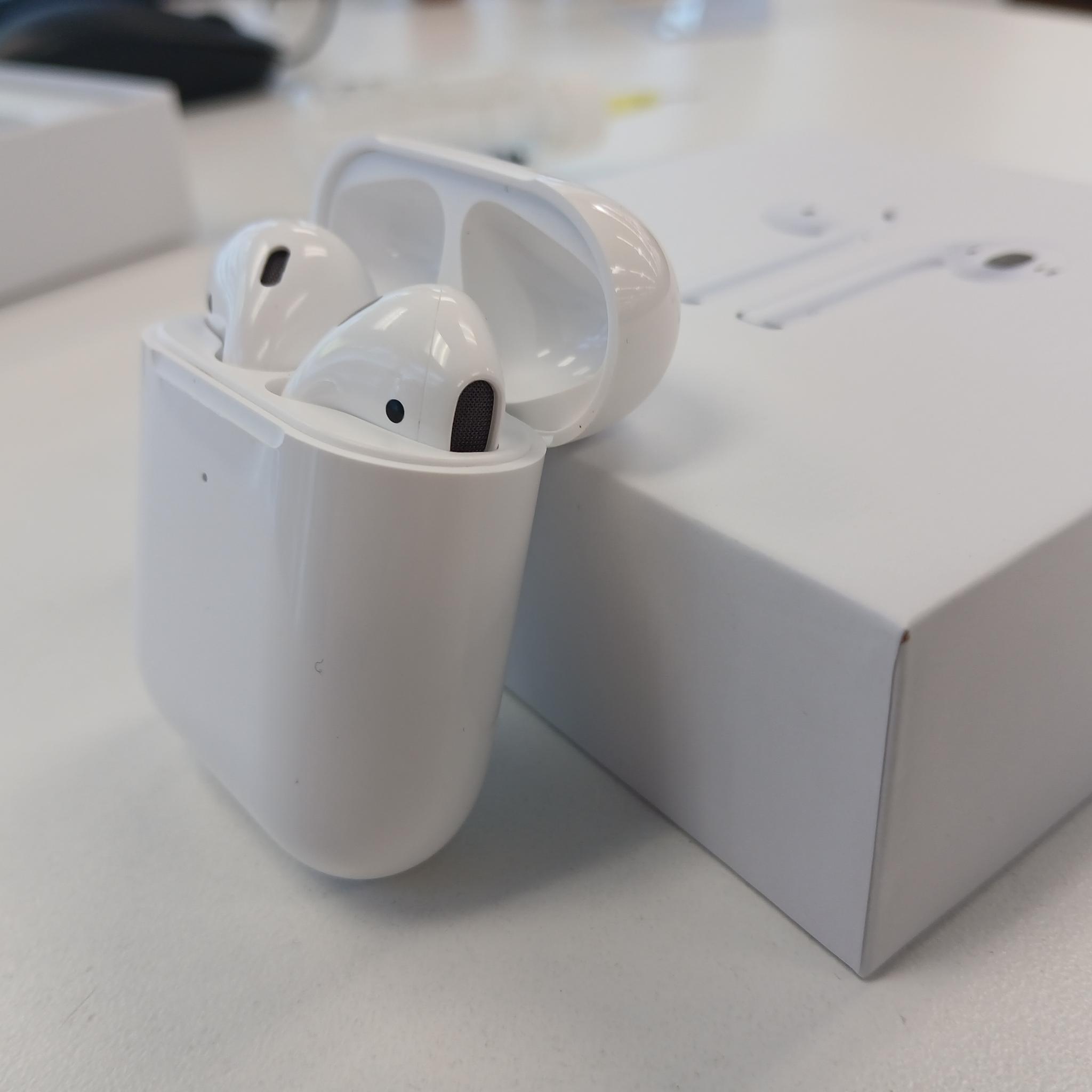 Airpods original packaging, charger and manual