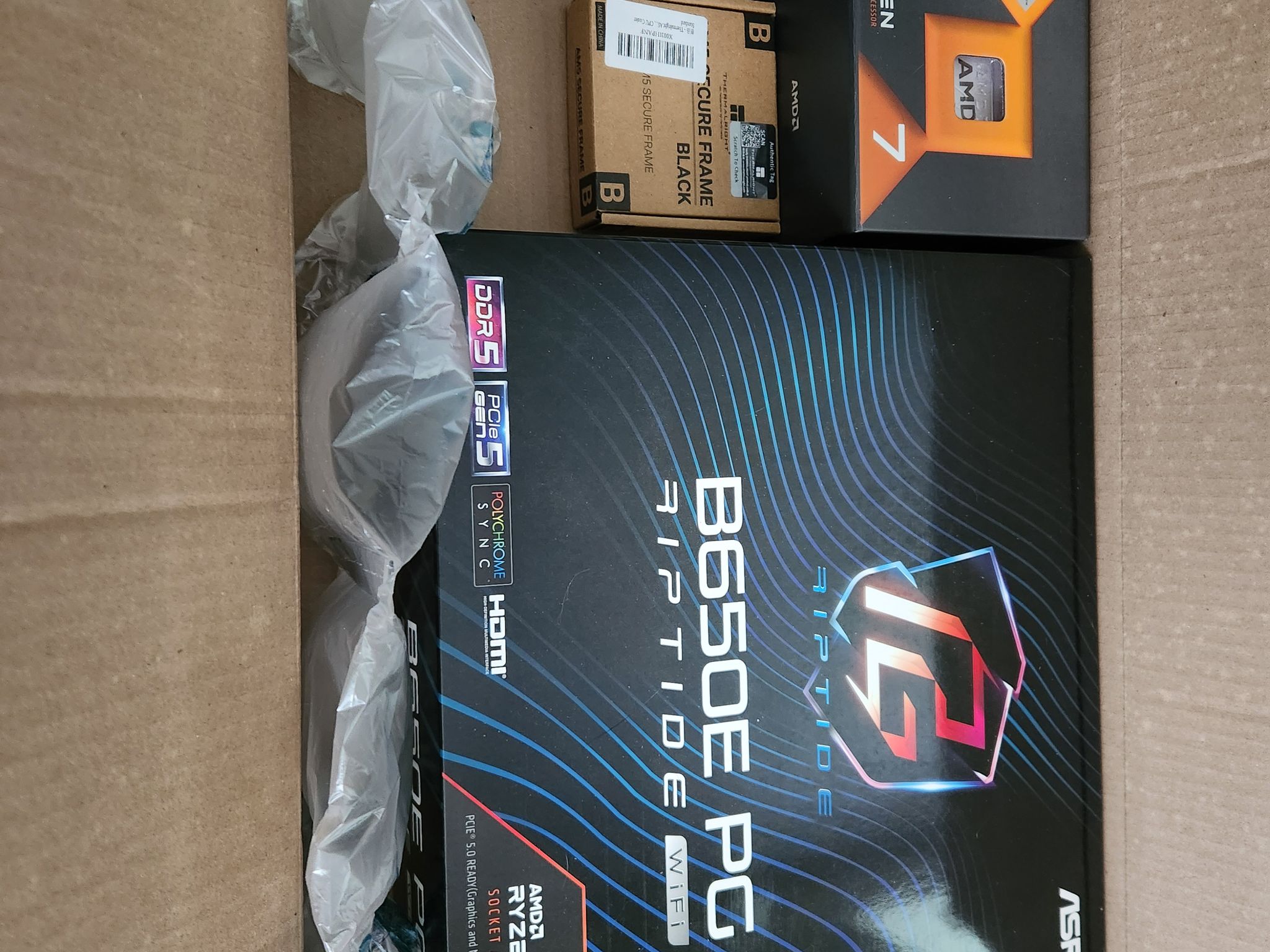 AMD Ryzen 7 7800X3D + ASRock B650E PG Riptide WiFi + Thermaltake Contact Frame Bundle - MINT w/ All