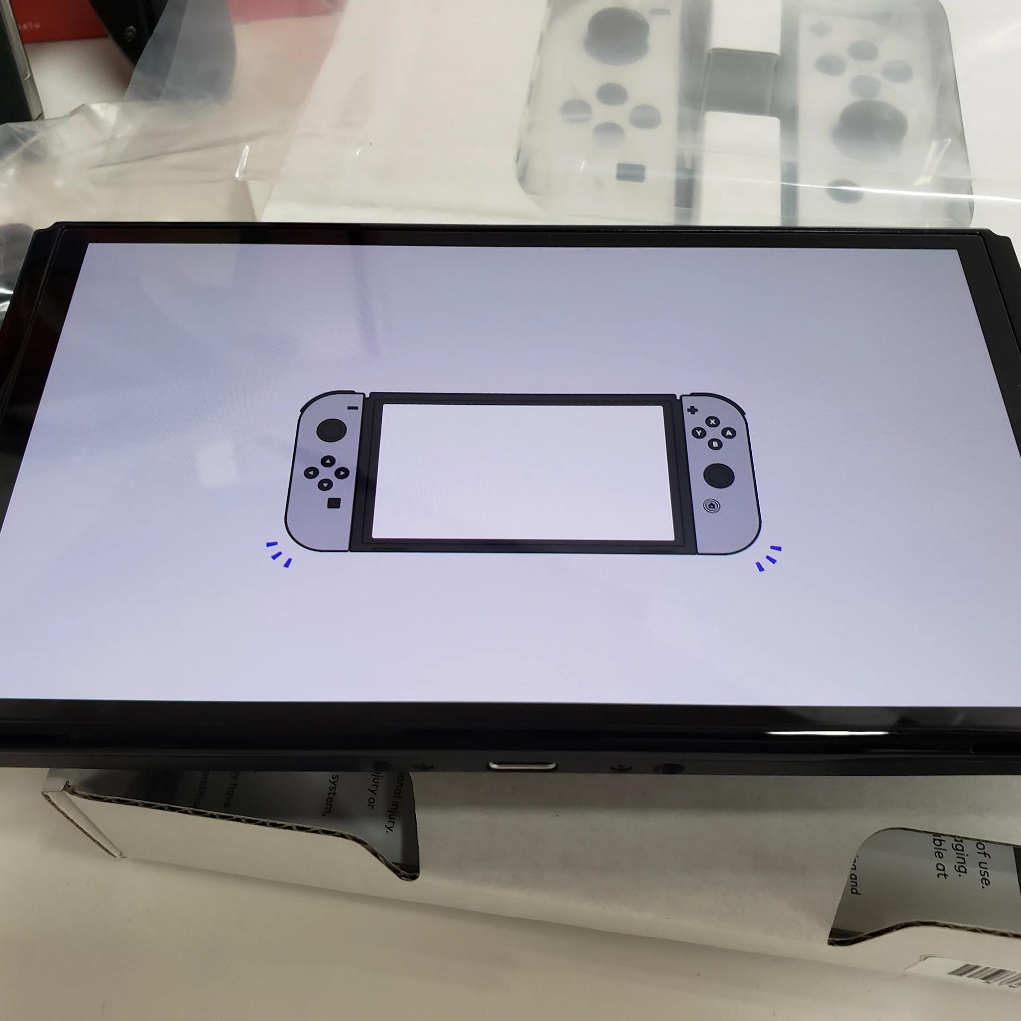 Nintendo Switch OLED Model w/ White Joy-Controllers