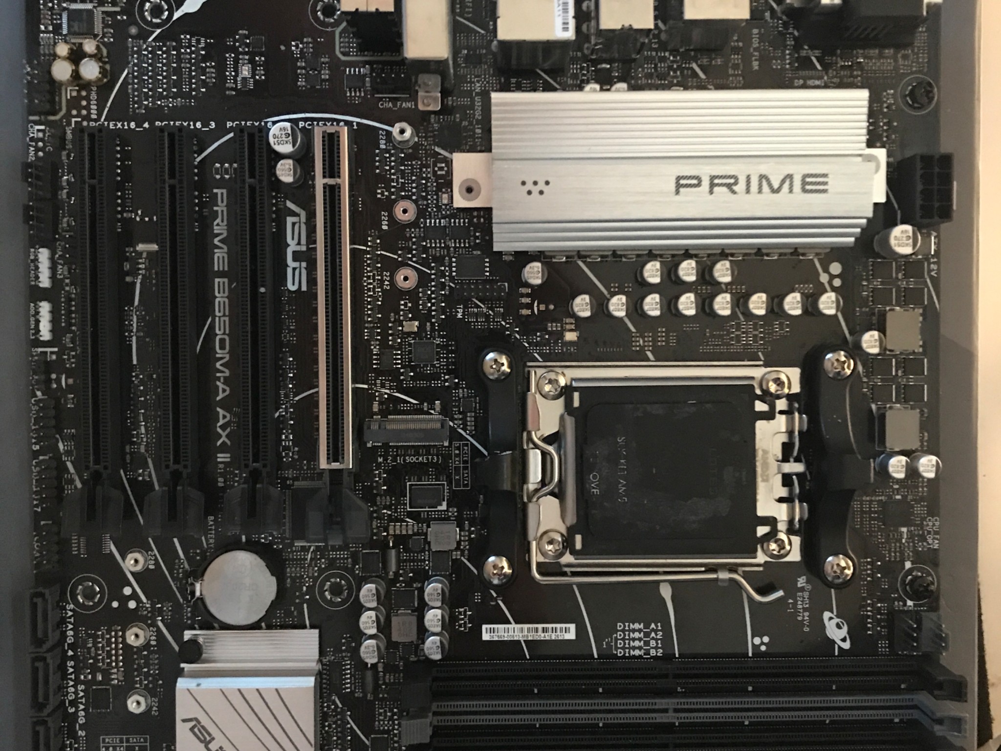 (AM5) ASUS B650M AX MICRO ATX - Like new, bought new within 5 months {INCLUDES WIFI6}