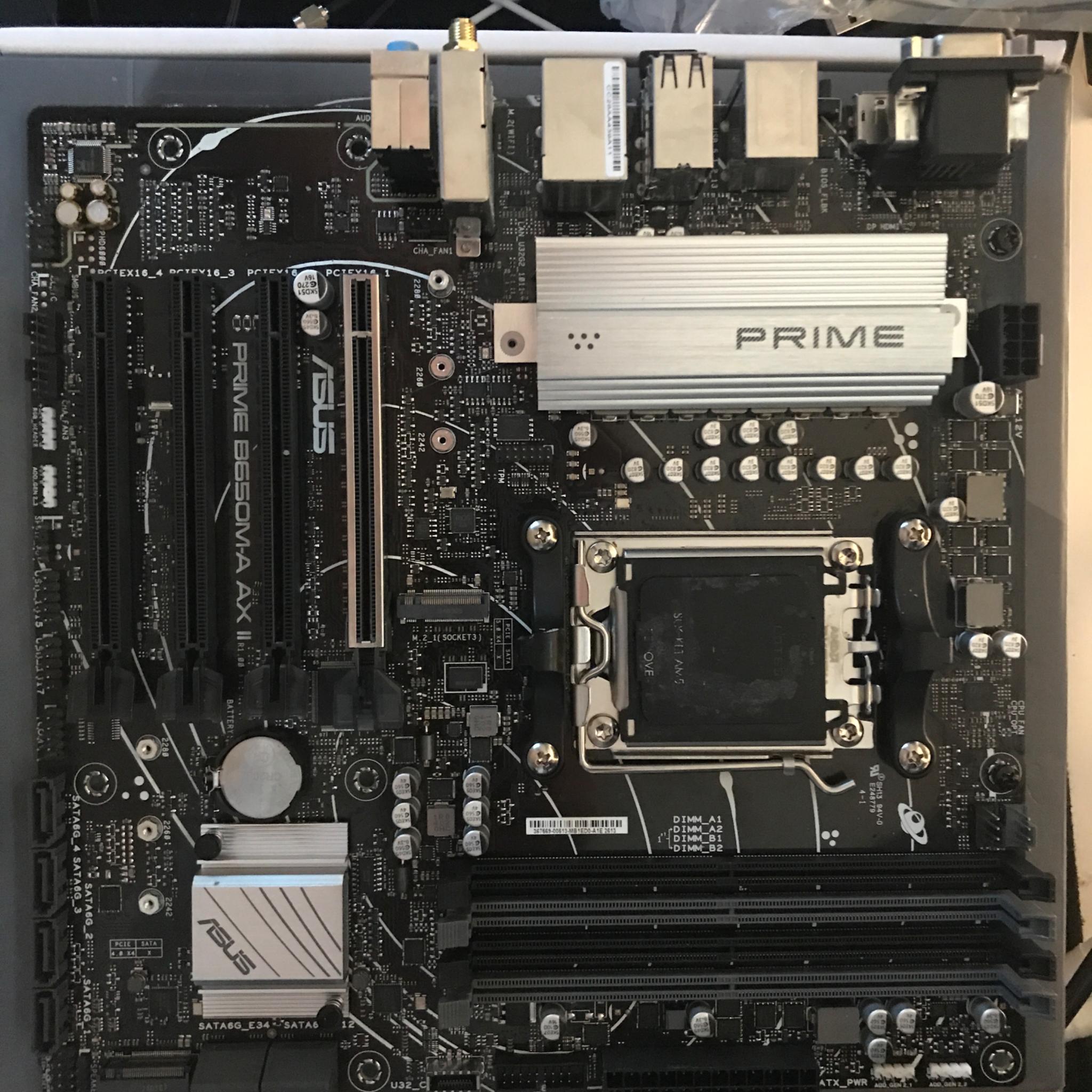 (AM5) ASUS B650M AX MICRO ATX - Like new, bought new within 5 months {INCLUDES WIFI6}