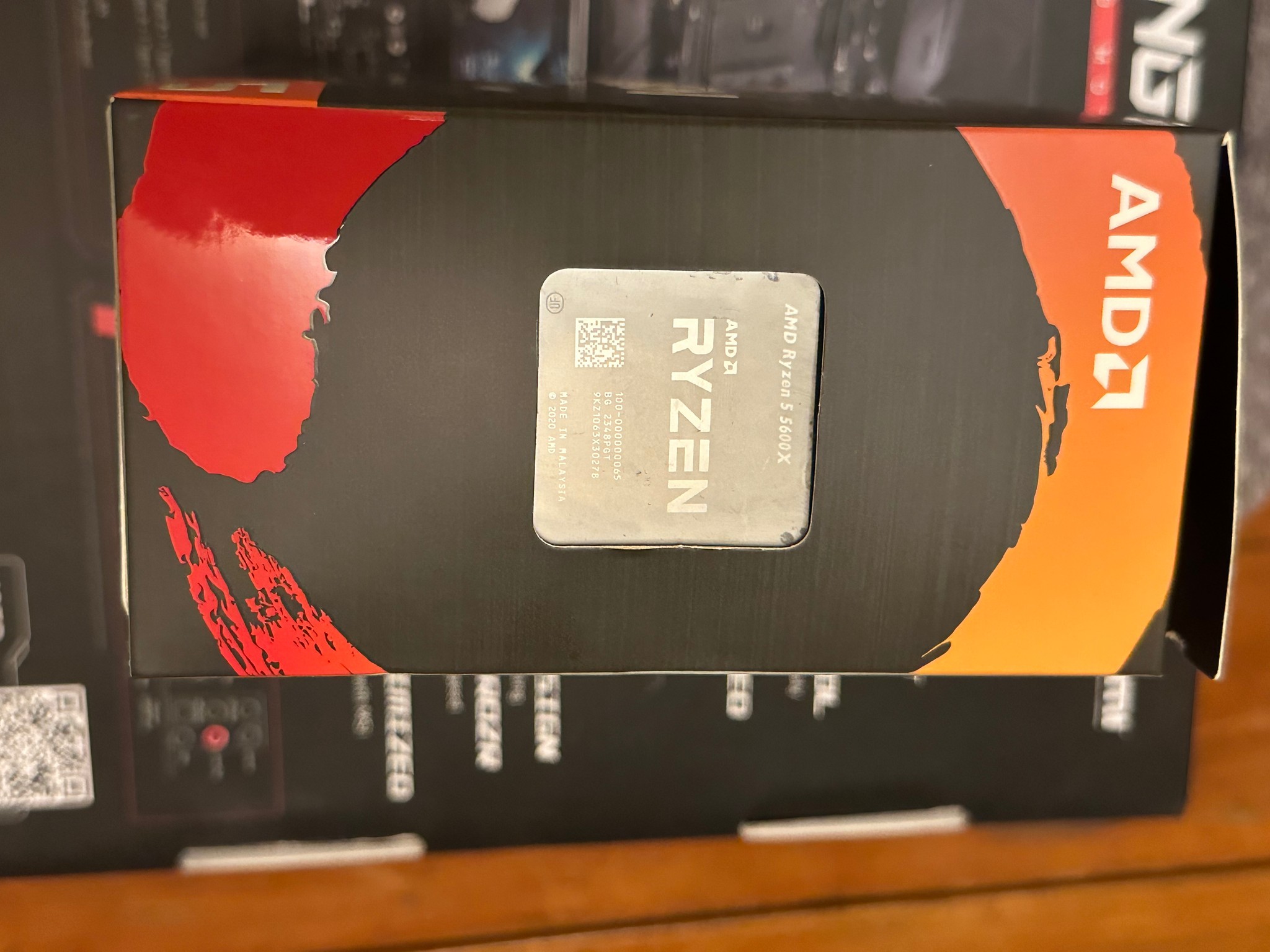 AMD Ryzen5 5600 X and stock cooler with box.