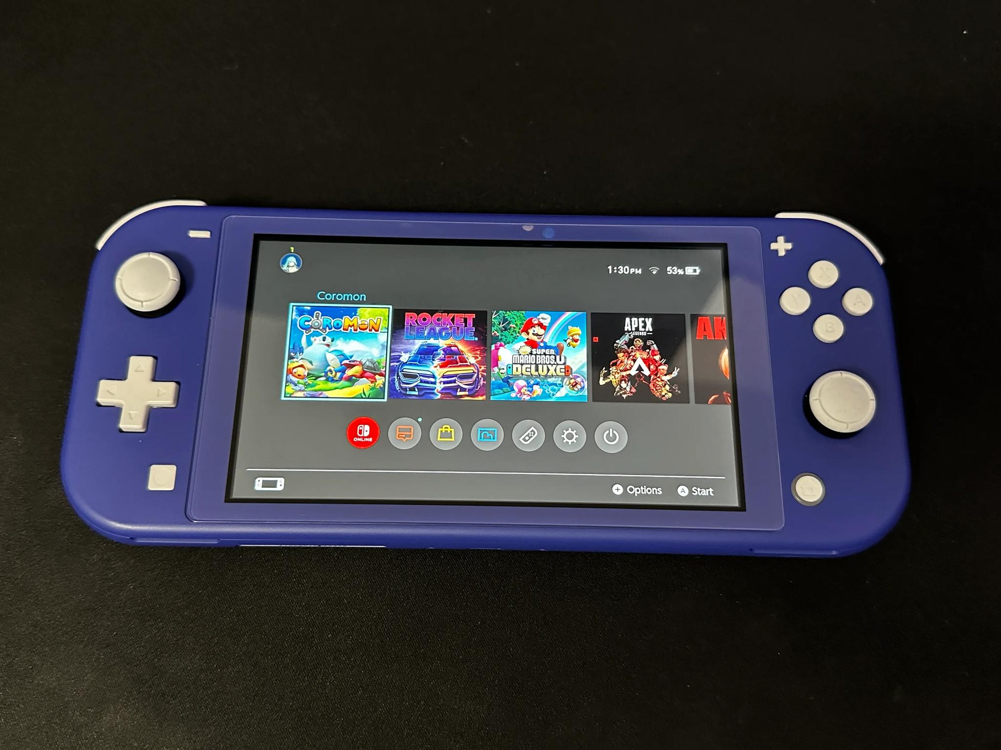 Nintendo Switch Lite 32GB (Blue) BUNDLE (Case + 5 Games Included)