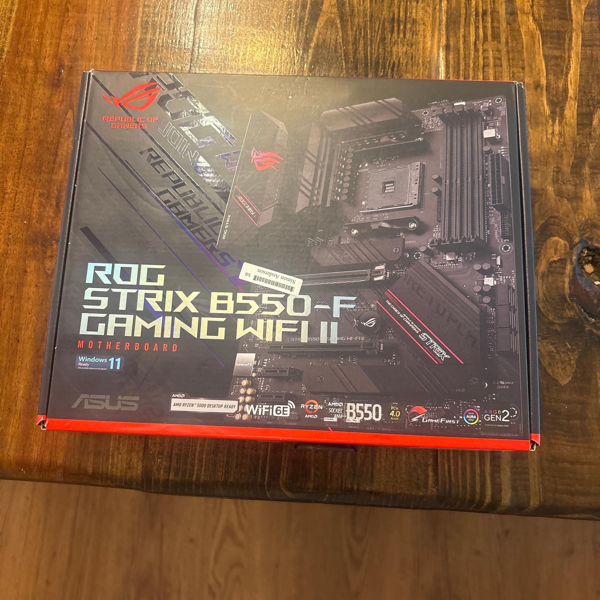 Used but good condition Rog motherboard and Ryzen 5 5500 CPU with stock AMD cooler
