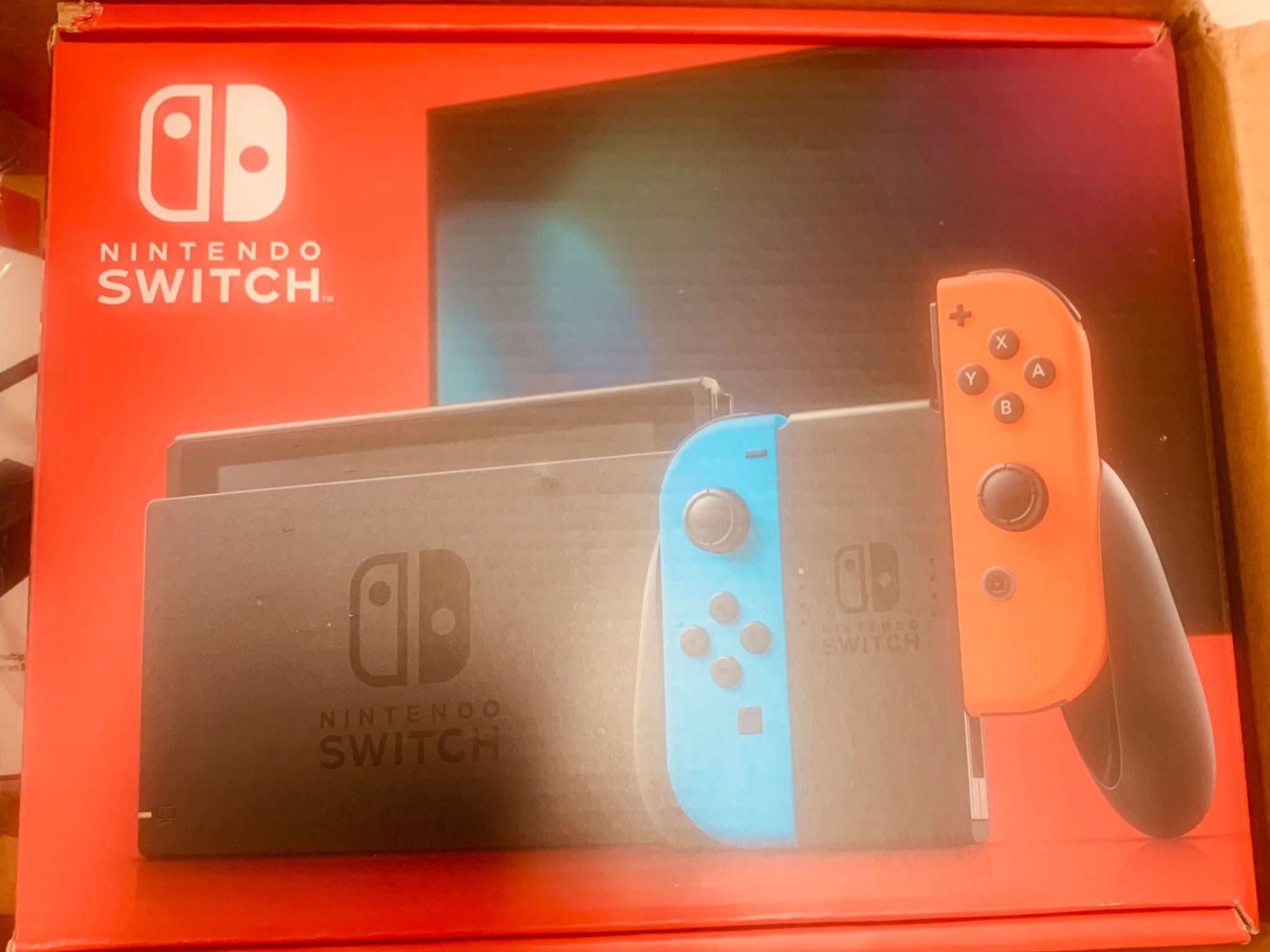 New in box Nintendo switch (v2) + controller + ethernet adapter