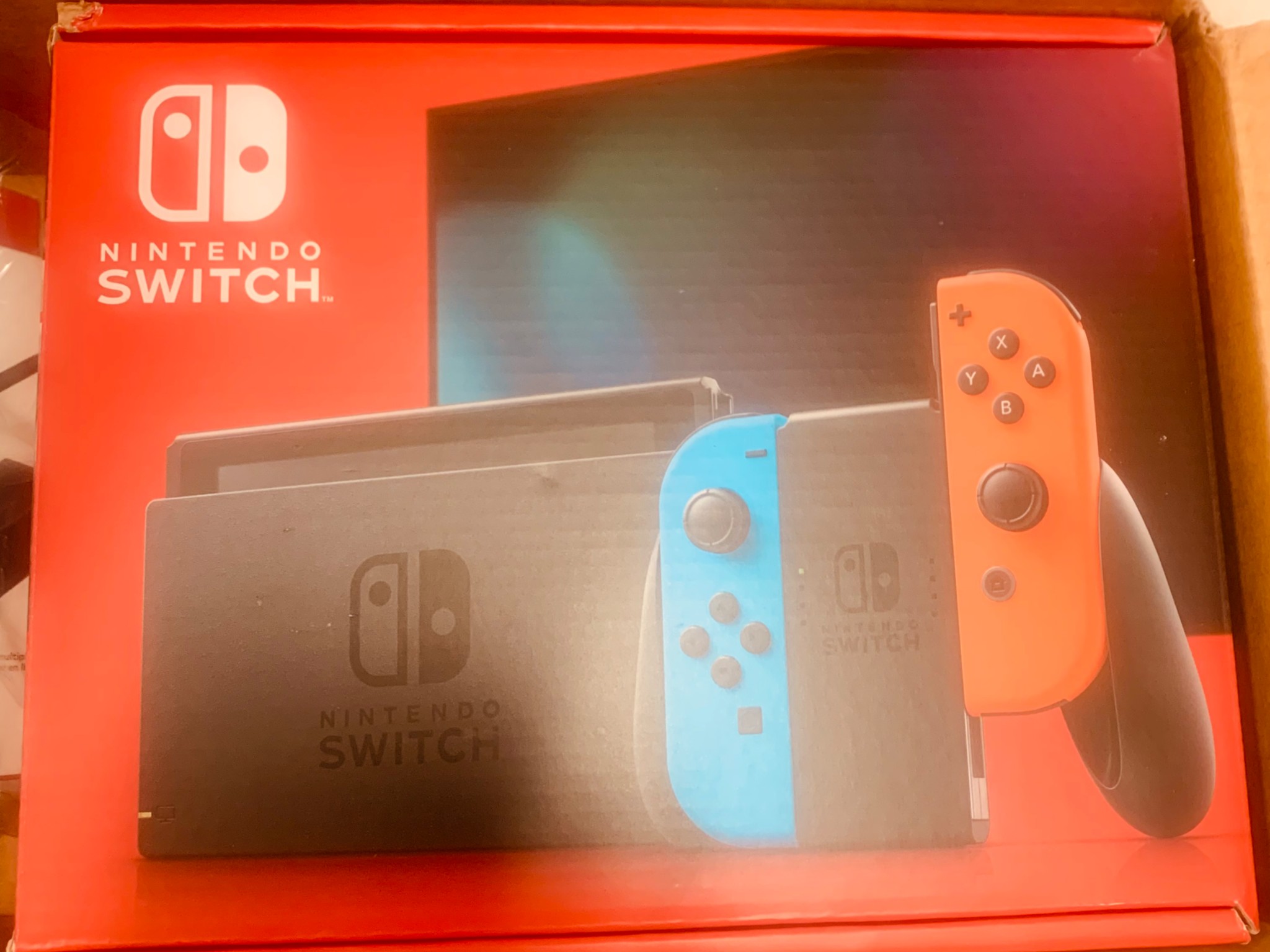 New in box Nintendo switch (v2) + controller + ethernet adapter