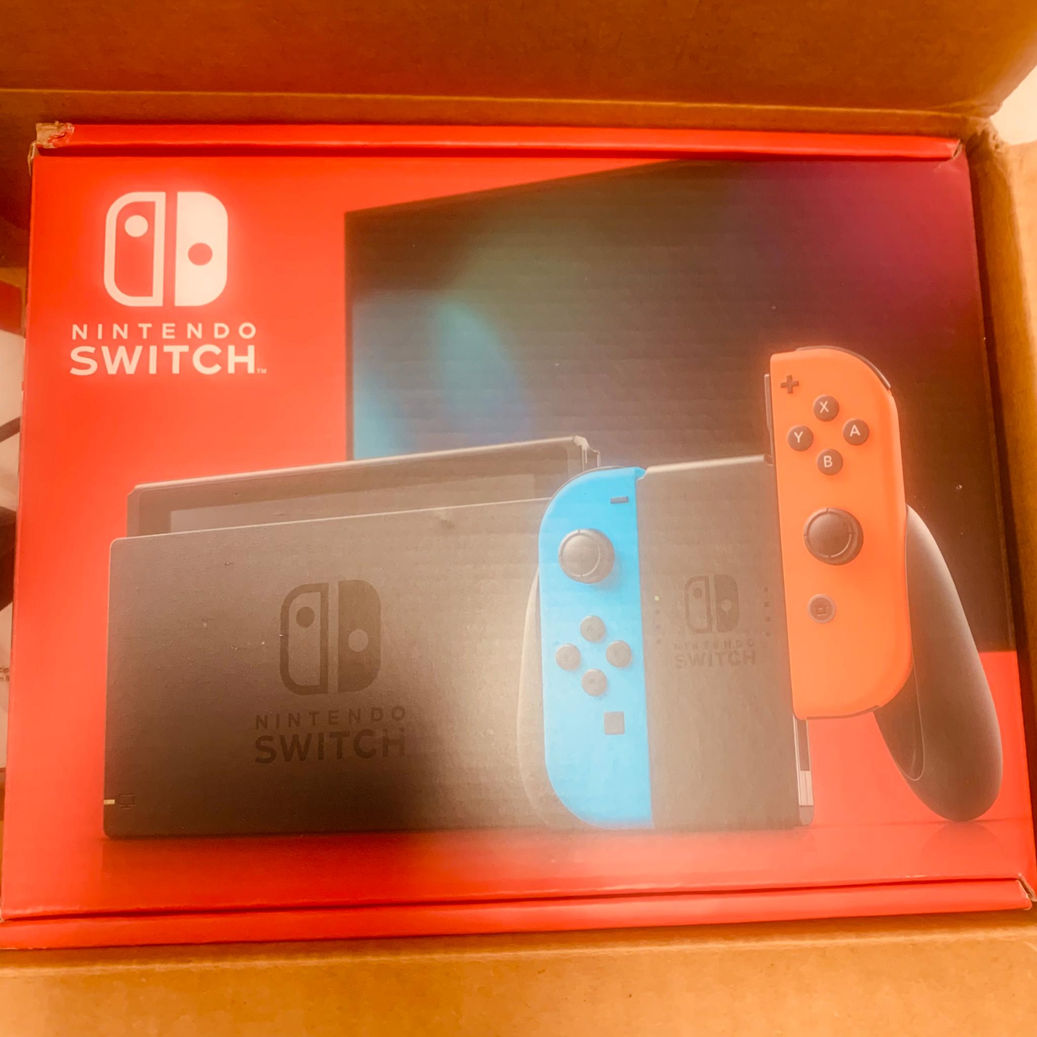 New in box Nintendo switch (v2) + controller + ethernet adapter