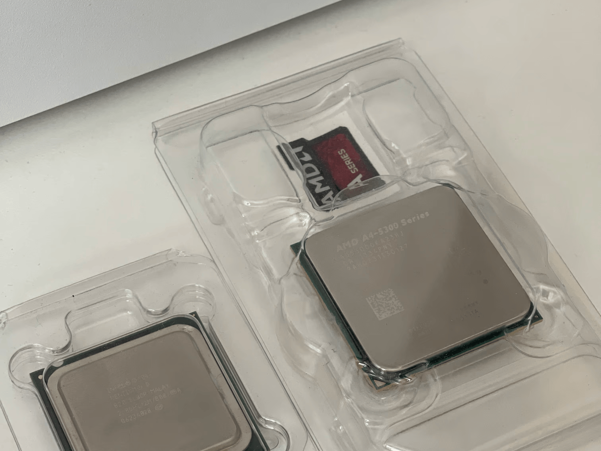 Two CPUs: AMD A4-5300 and Intel Pentium D 820