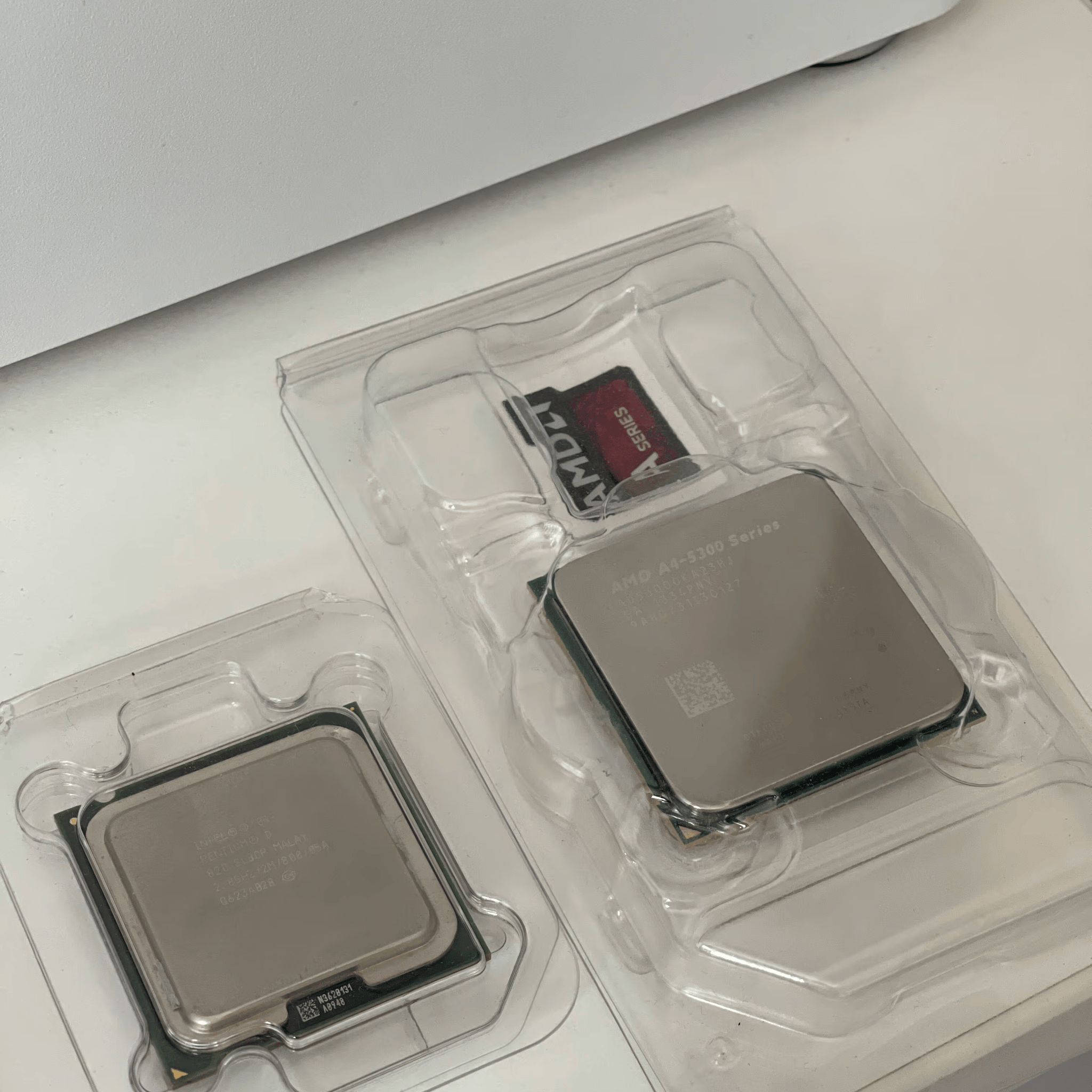 Two CPUs: AMD A4-5300 and Intel Pentium D 820
